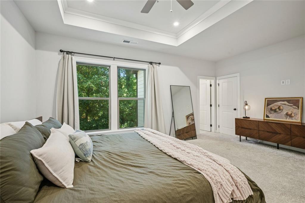 1332 Stanley Park Drive Decatur, GA 30033 - Photo 35 of 75 a bed room with a bed and a couch