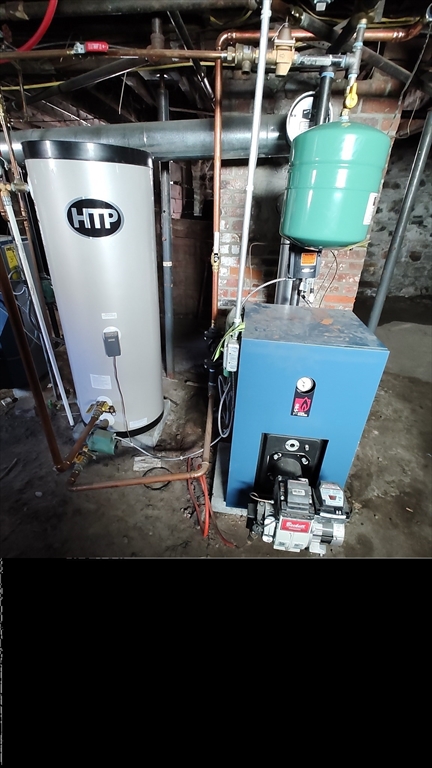 46 Irving Street Everett, MA 02149 - Photo 37 of 42 a view of a room with gym equipment