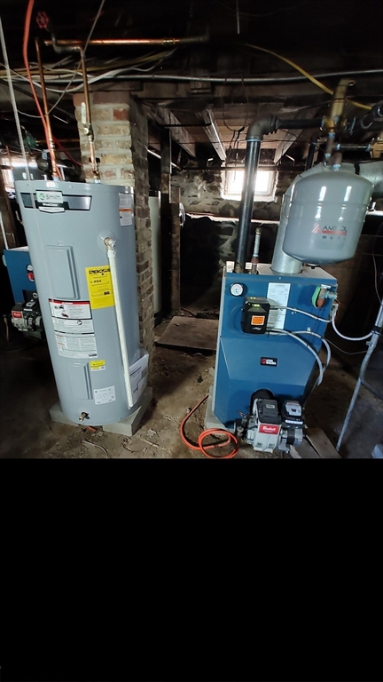 46 Irving Street Everett, MA 02149 - Photo 38 of 42 a view of a room with gym equipment