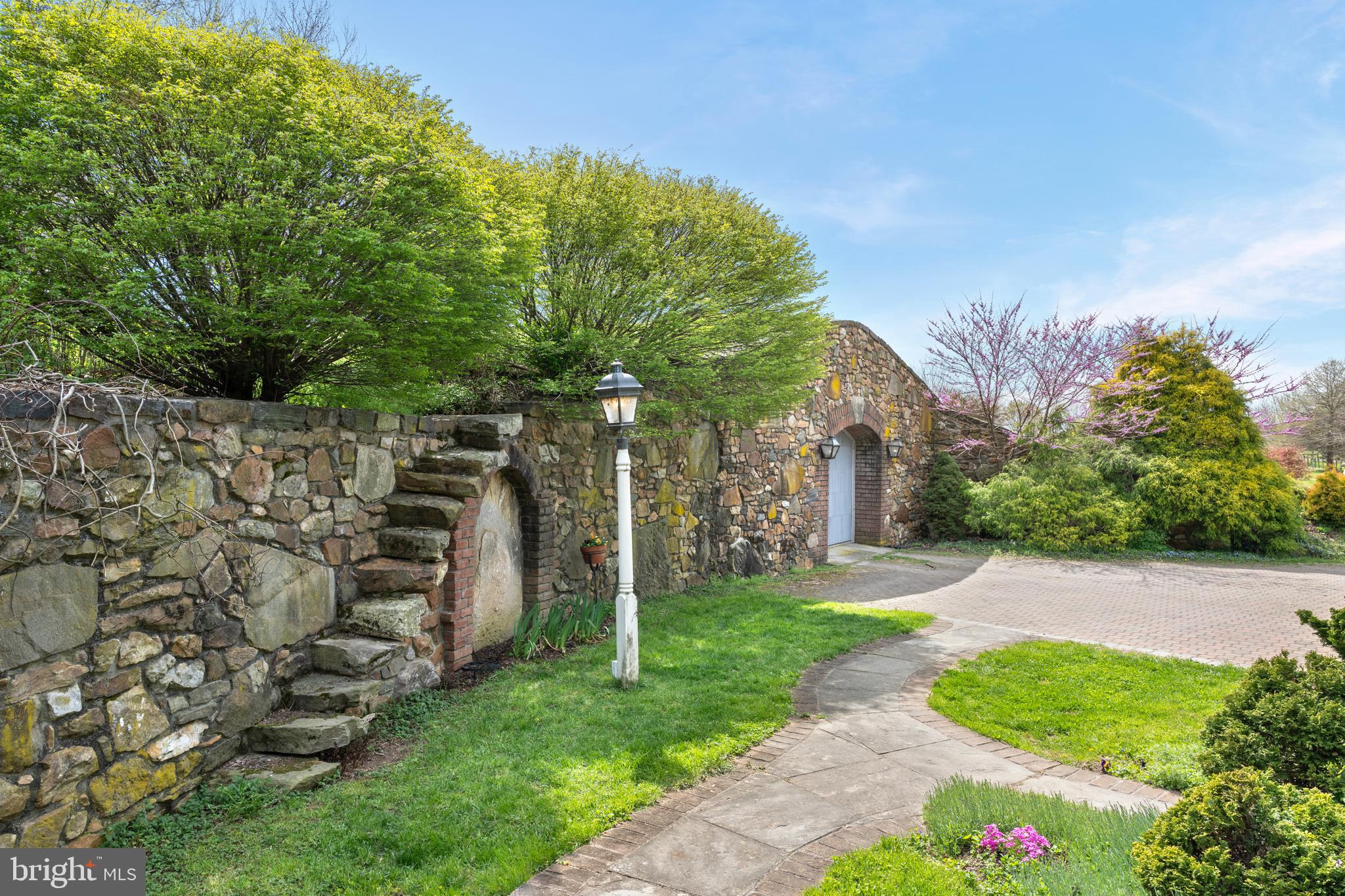 500 Bartram Road Kennett Square, PA 19348 - Photo 11 of 70 Stonework & Mature Landscaping Throughout