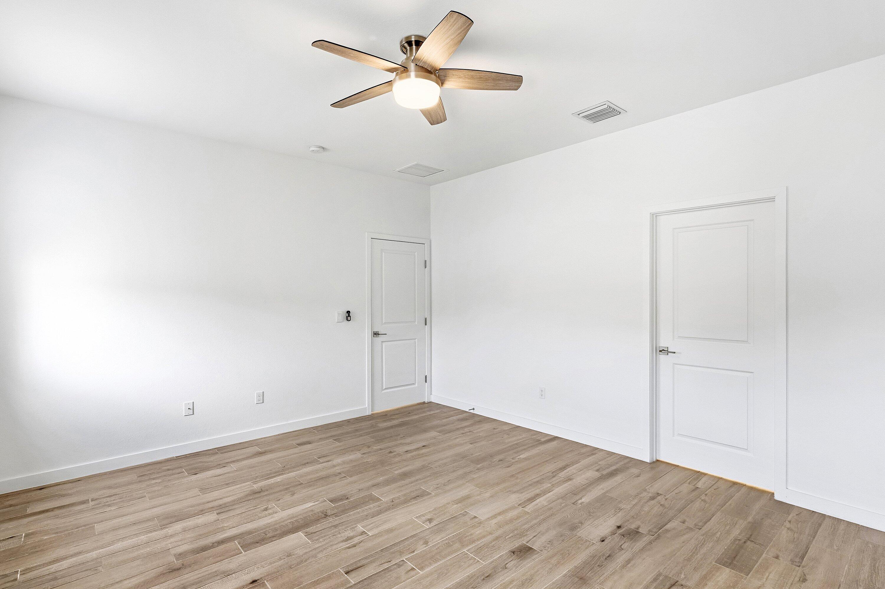 18446 Claybrook Street Jupiter, FL 33458 - Photo 11 of 25 wooden floor in an empty room