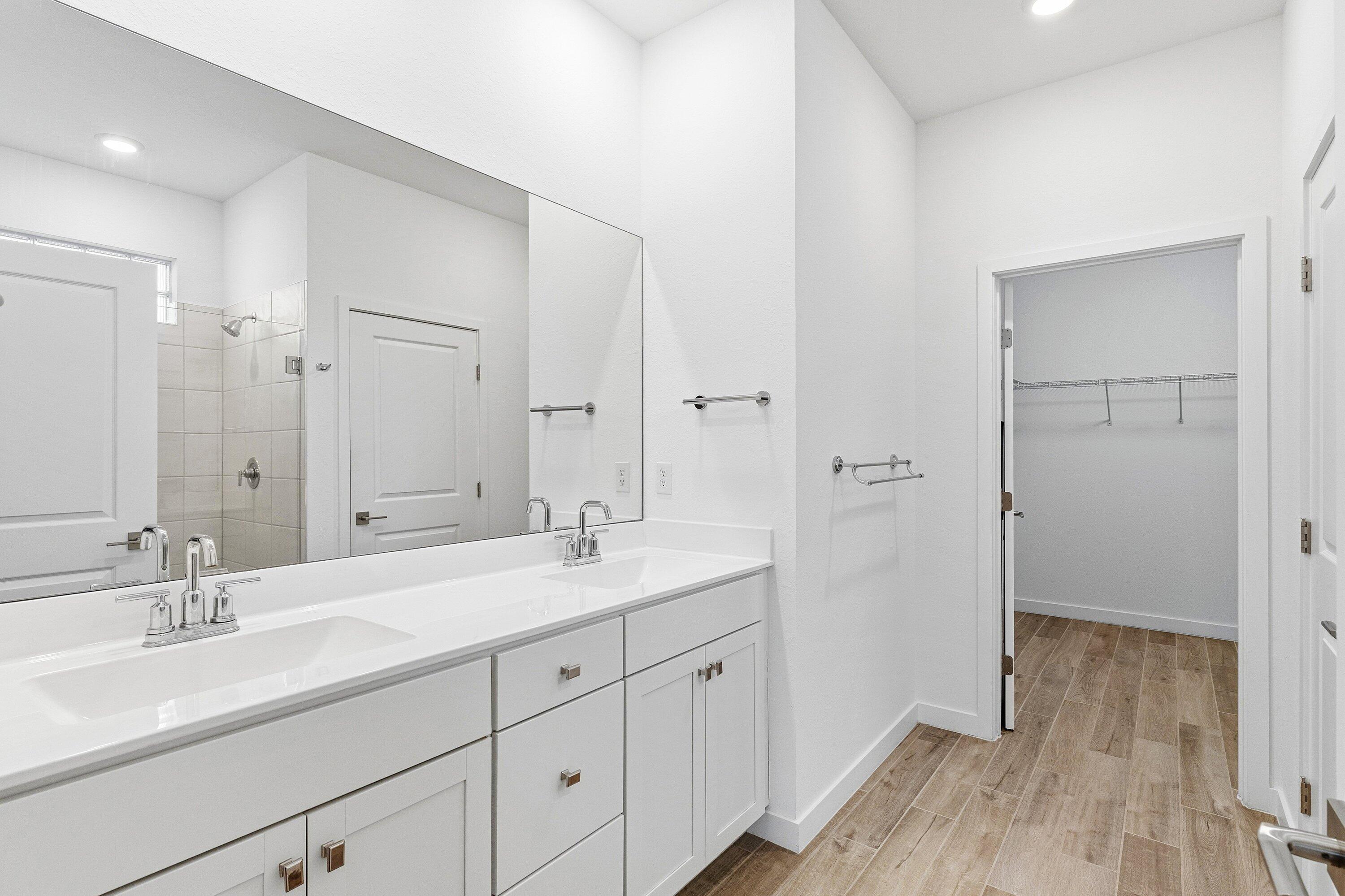 18446 Claybrook Street Jupiter, FL 33458 - Photo 12 of 25 a bathroom with a sink and a mirror