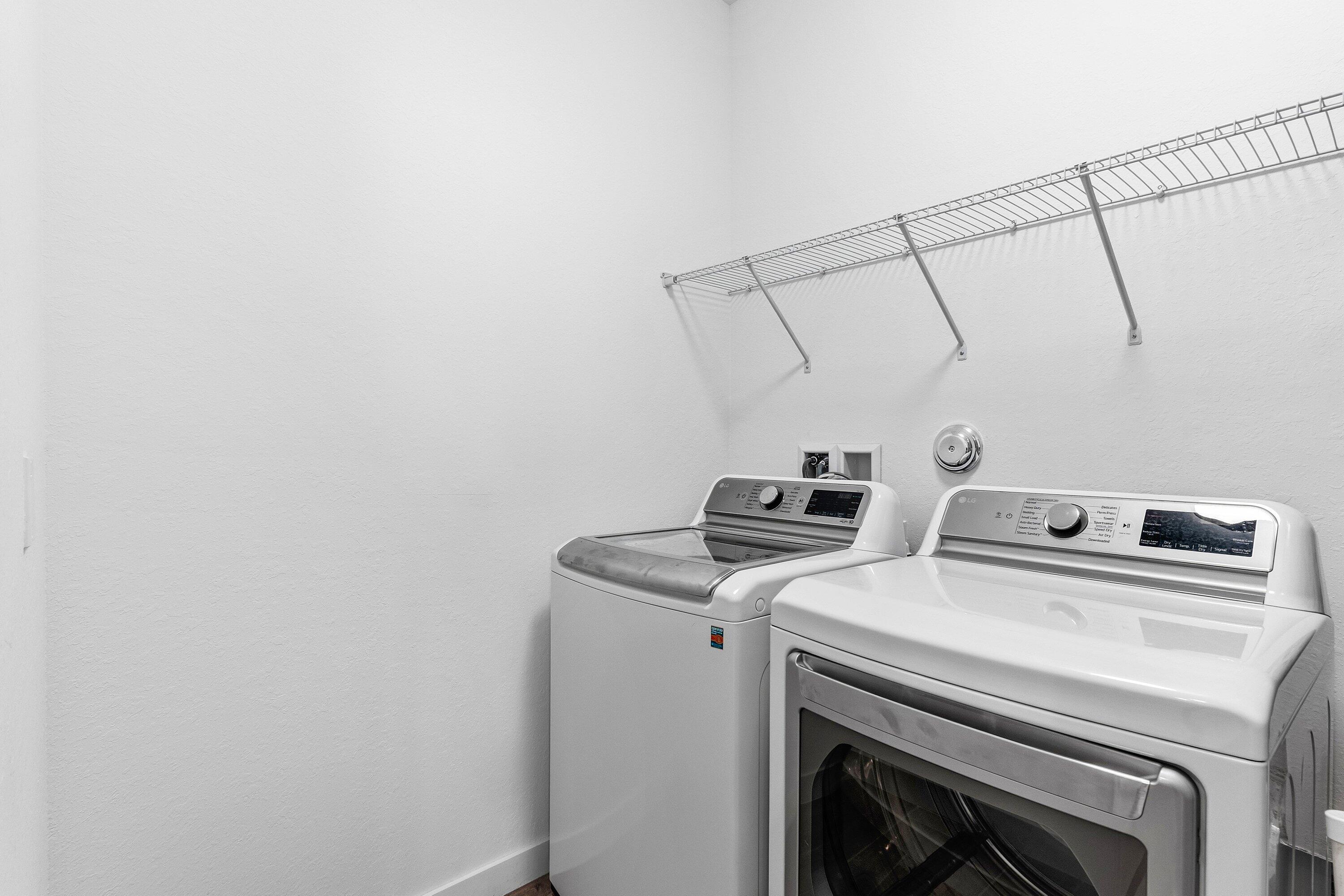 18446 Claybrook Street Jupiter, FL 33458 - Photo 9 of 25 a utility room with dryer and washer