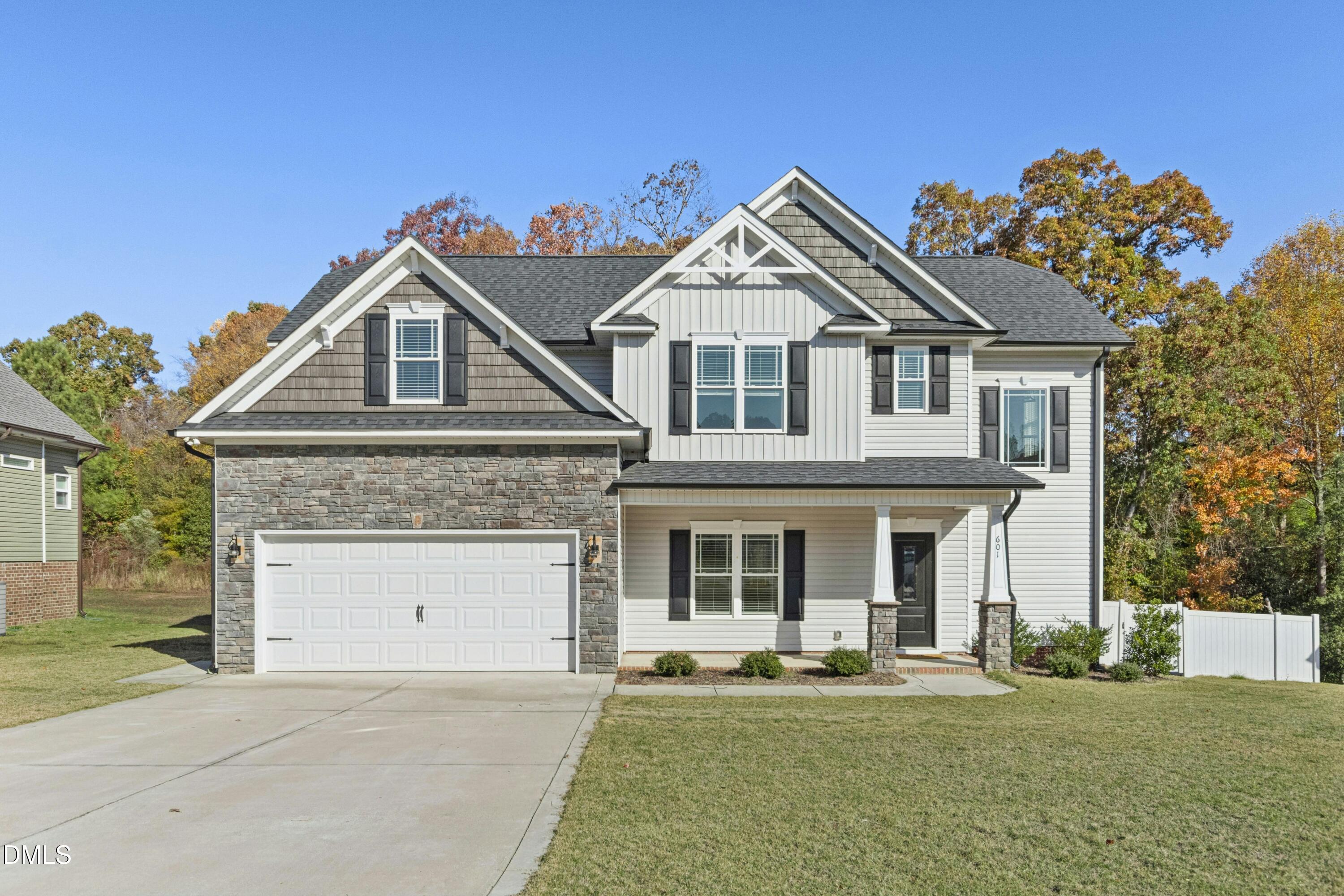601 Joseph Alexander Drive Fuquay-Varina, NC 27526 - Photo 1 of 39 front view of a house with a yard