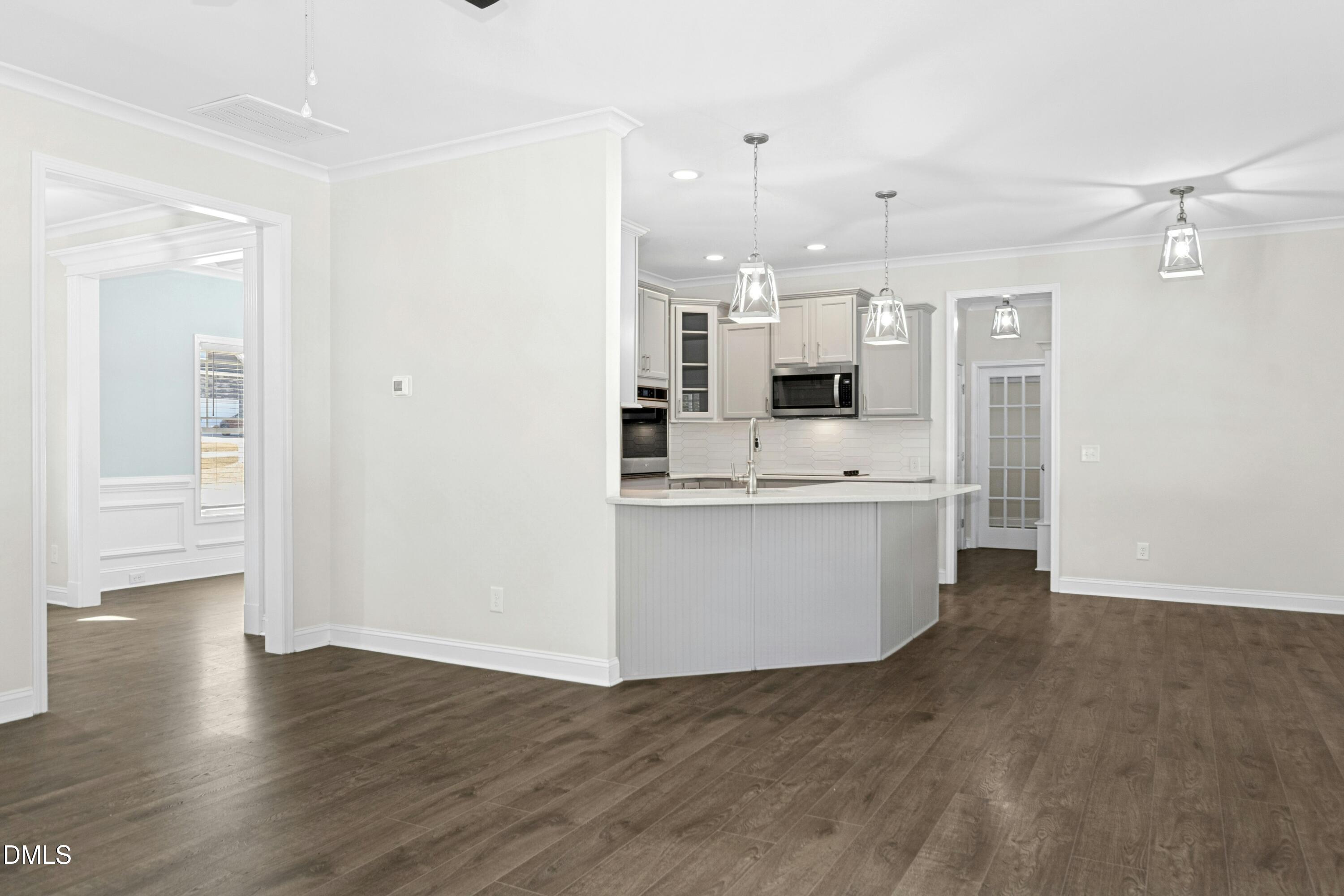 601 Joseph Alexander Drive Fuquay-Varina, NC 27526 - Photo 9 of 39 a view of kitchen with wooden floor