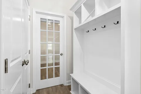 a bathroom with a tub and a window