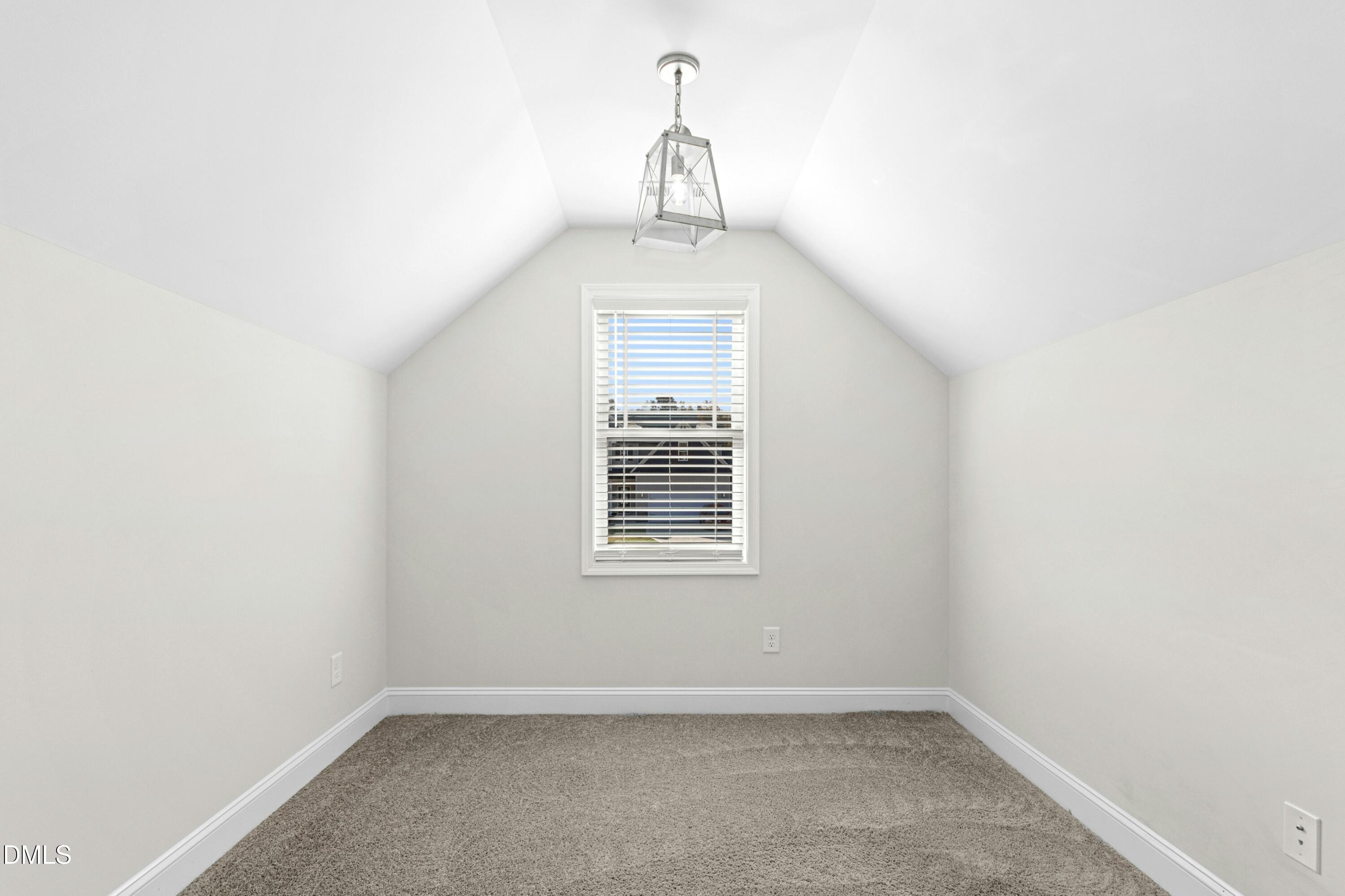 601 Joseph Alexander Drive Fuquay-Varina, NC 27526 - Photo 23 of 39 an empty room with a window