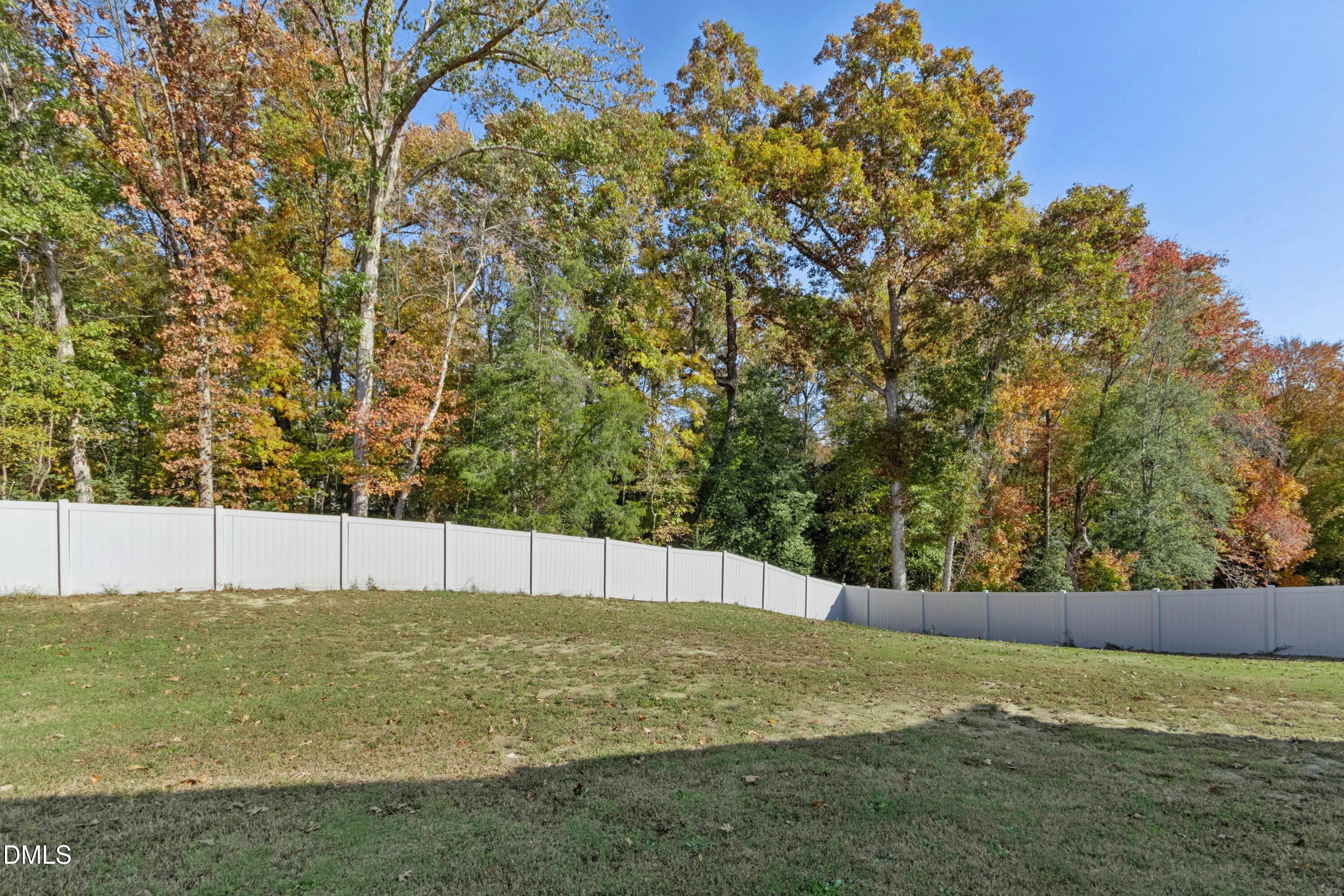 601 Joseph Alexander Drive Fuquay-Varina, NC 27526 - Photo 32 of 39 a view of a field with an trees