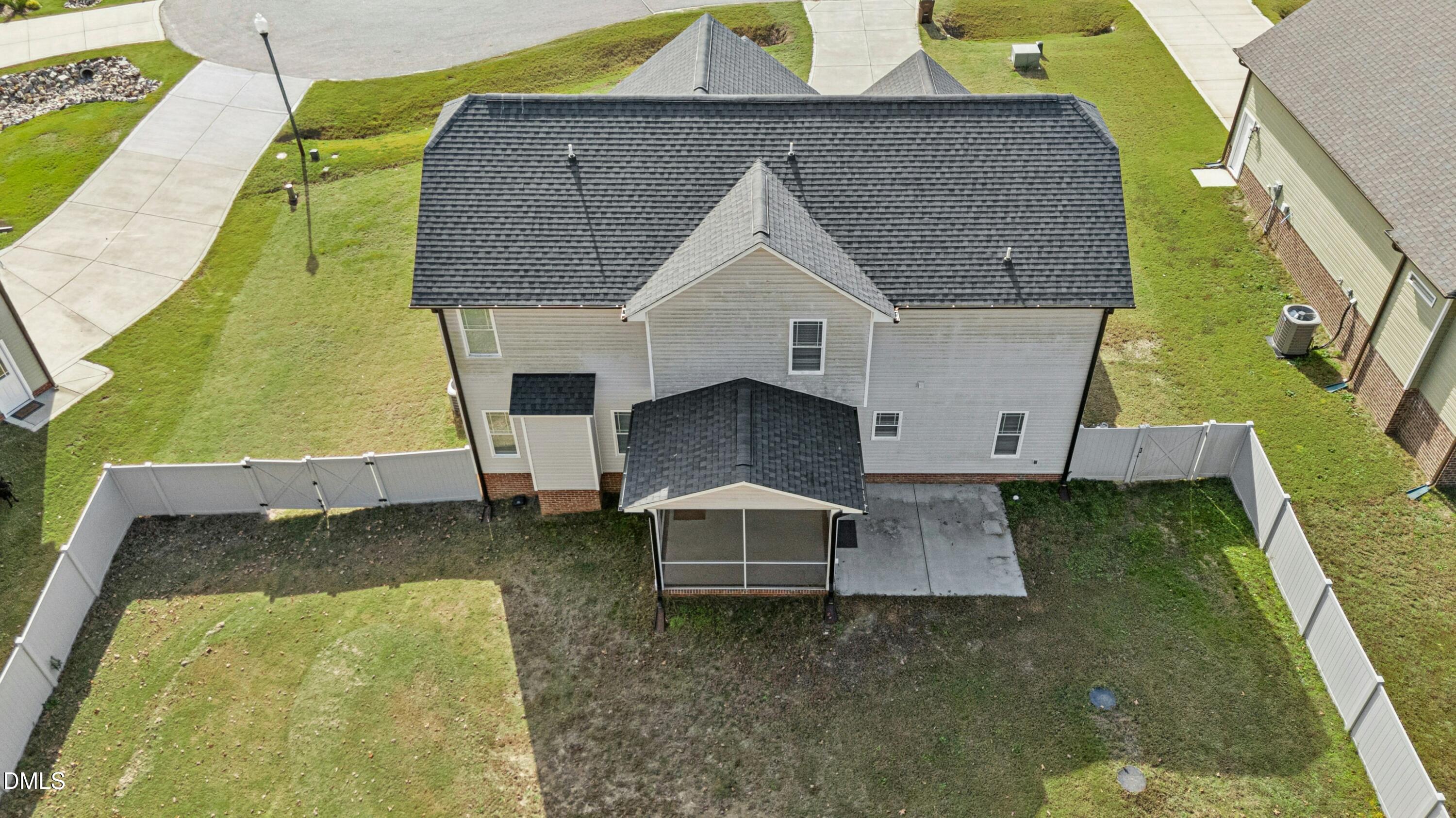 601 Joseph Alexander Drive Fuquay-Varina, NC 27526 - Photo 34 of 39 an aerial view of a house with a yard