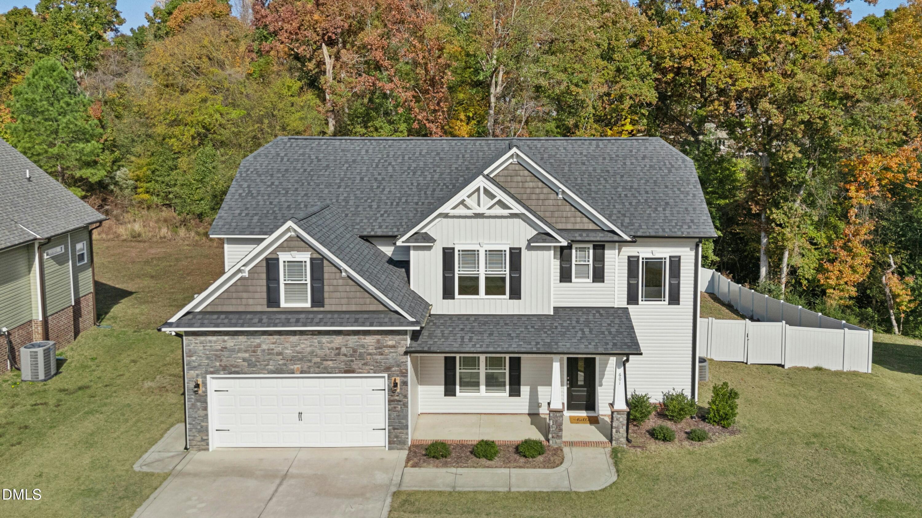 601 Joseph Alexander Drive Fuquay-Varina, NC 27526 - Photo 35 of 39 front view of a house with a yard