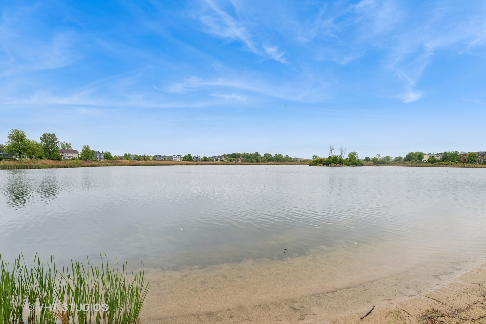 970 Harris Road, Unit 33 Grayslake, IL 60030 - Photo 23 of 24 a view of a lake with a city view