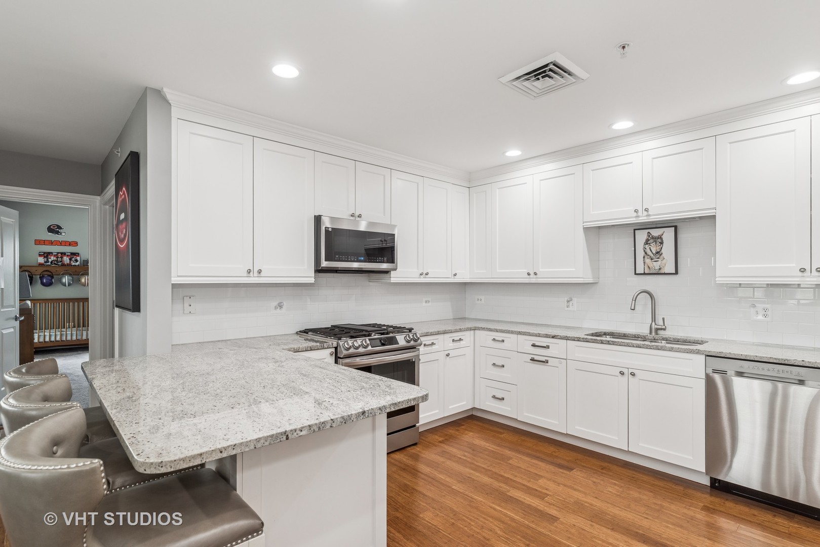970 Harris Road, Unit 33 Grayslake, IL 60030 - Photo 8 of 24 a kitchen with granite countertop white cabinets and white appliances