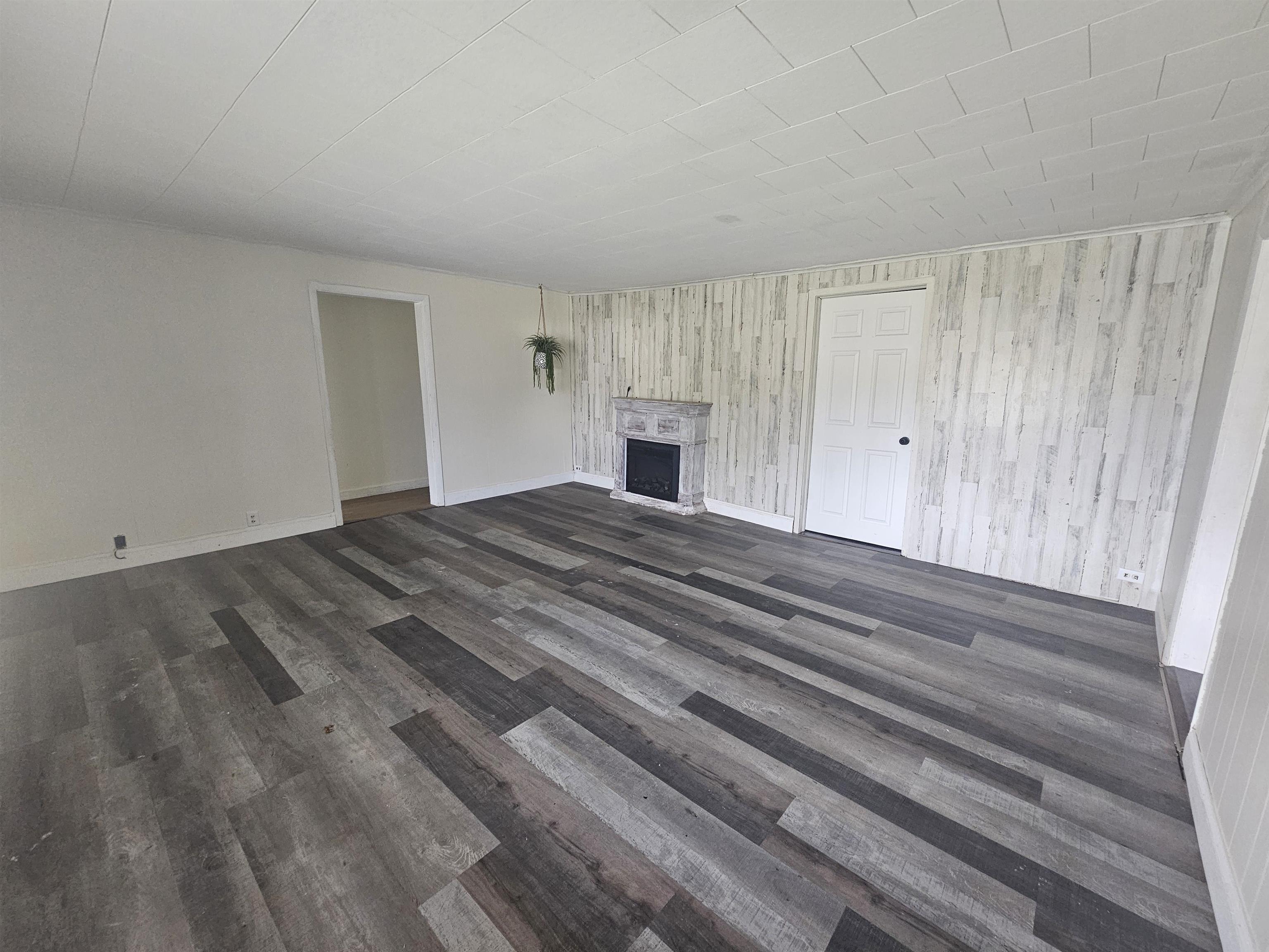 11115 Lamaster Road Marion, IL 62959 - Photo 14 of 26 a view of empty room with wooden floor