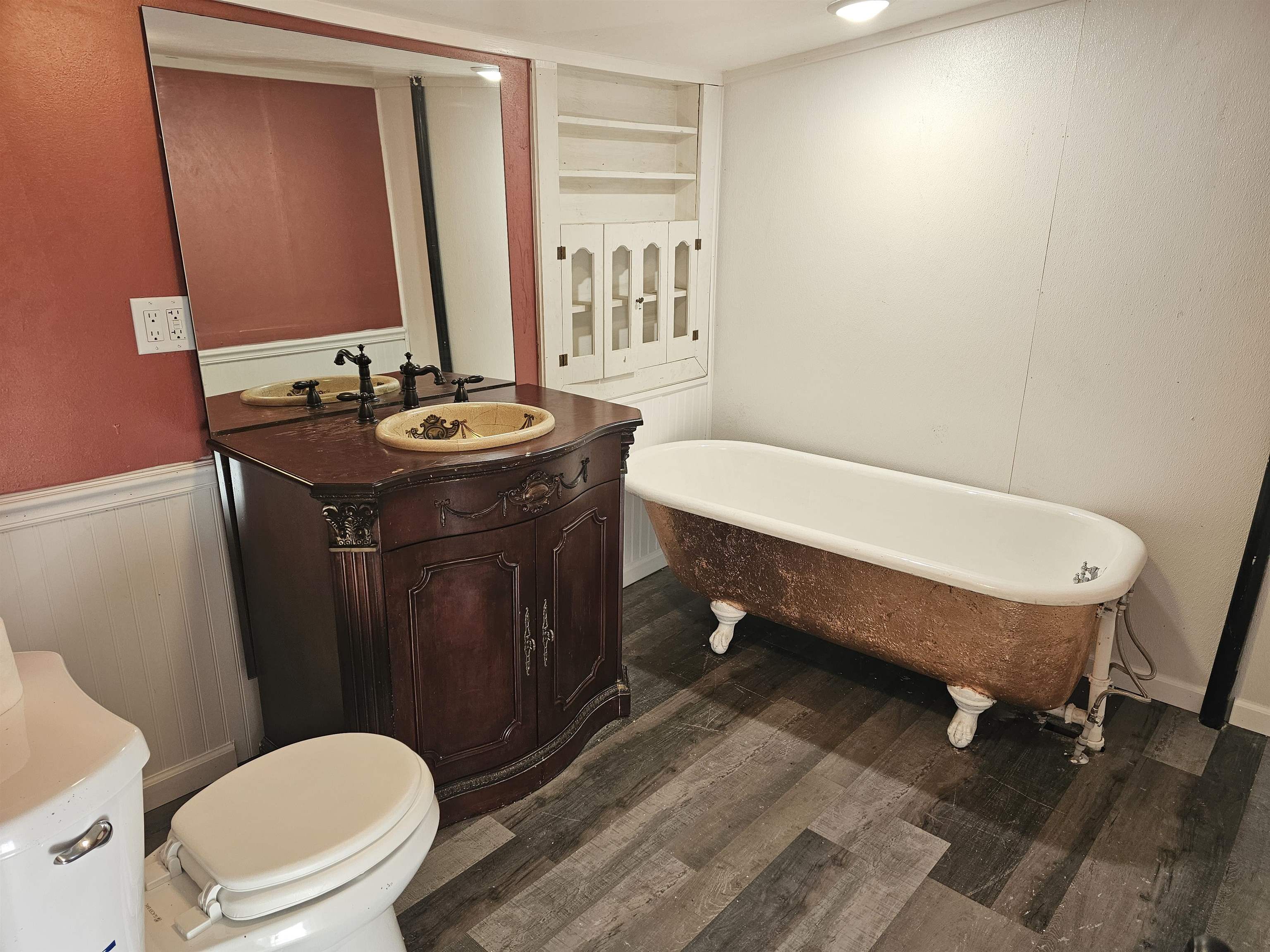 11115 Lamaster Road Marion, IL 62959 - Photo 17 of 26 a bathroom with a sink a toilet a mirror and vanity