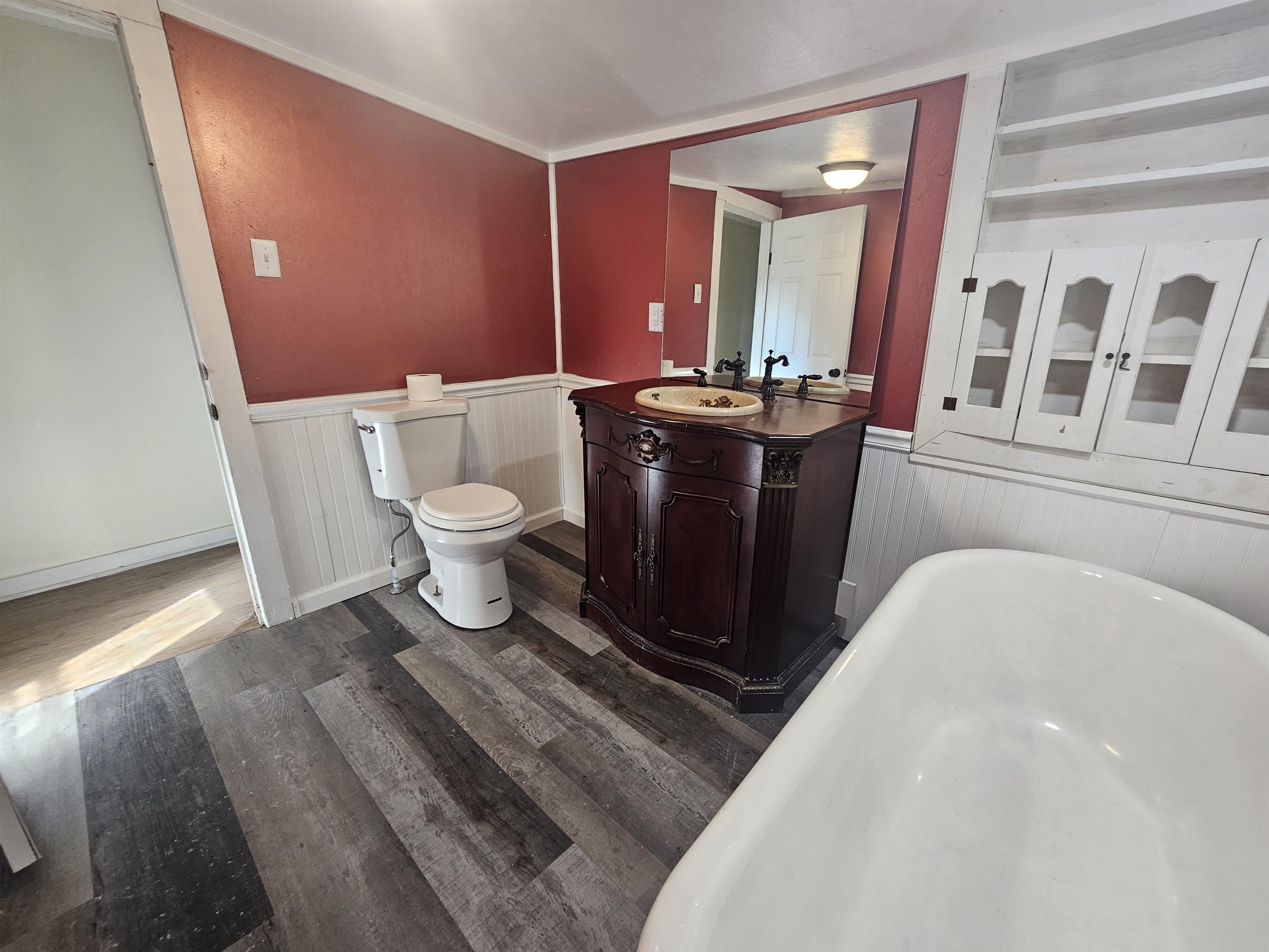 11115 Lamaster Road Marion, IL 62959 - Photo 18 of 26 a bathroom with a toilet a sink and a mirror