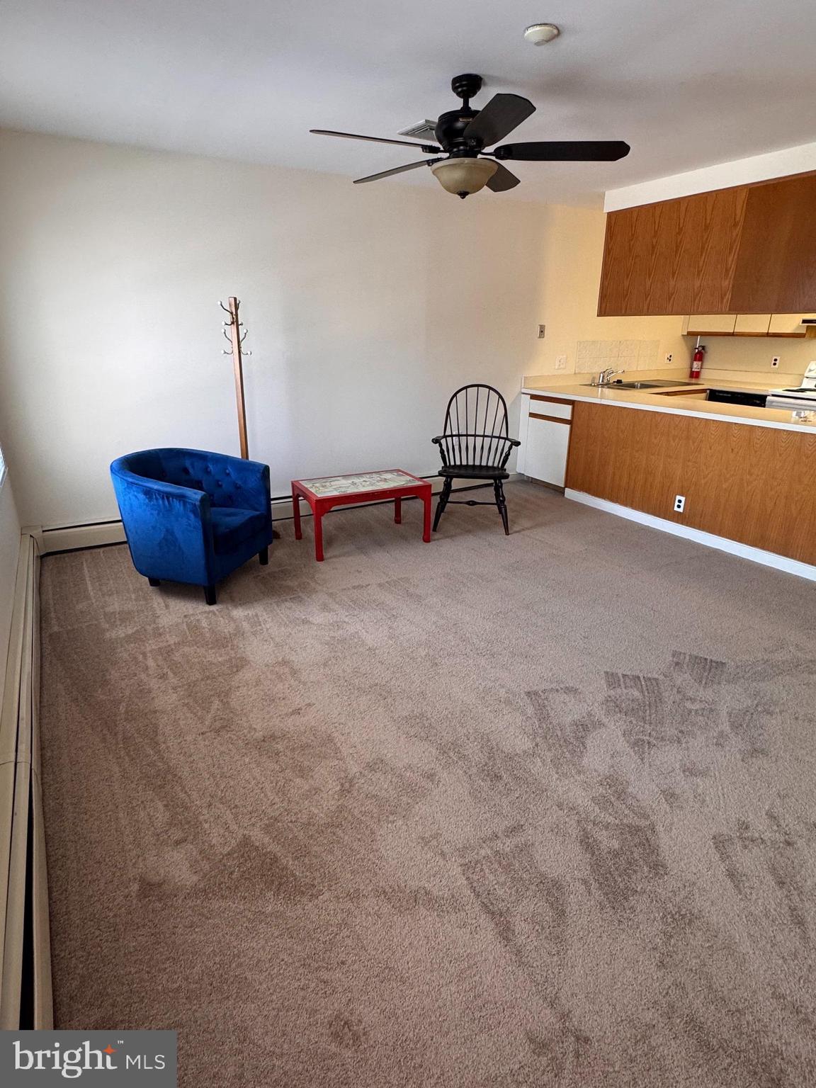 46 Buttonwood Street, Unit C Mount Holly, NJ 08060 - Photo 2 of 14 a view of a room with gym equipment