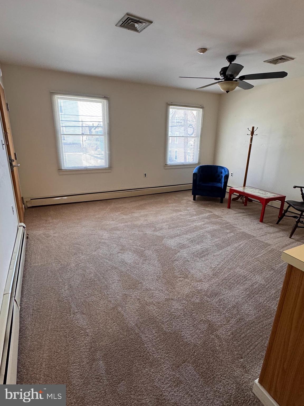 46 Buttonwood Street, Unit C Mount Holly, NJ 08060 - Photo 3 of 14 a view of a livingroom with furniture and a window