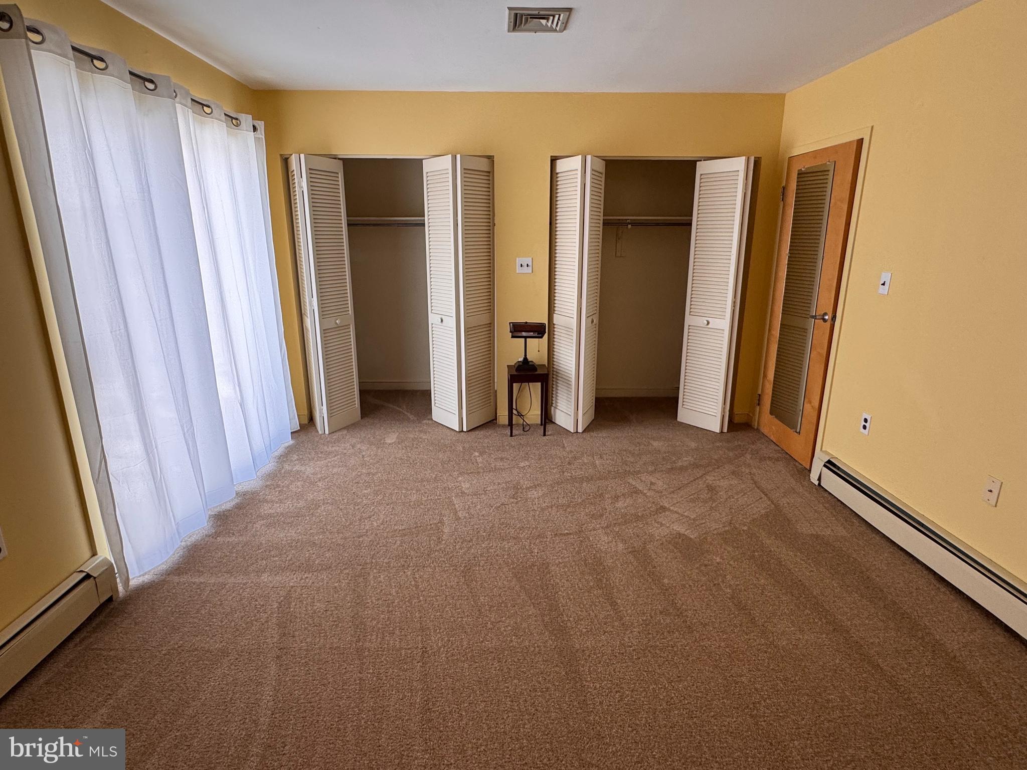46 Buttonwood Street, Unit C Mount Holly, NJ 08060 - Photo 9 of 14 a view of a room with closet