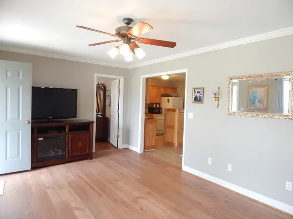 a view of a livingroom with a flat screen tv