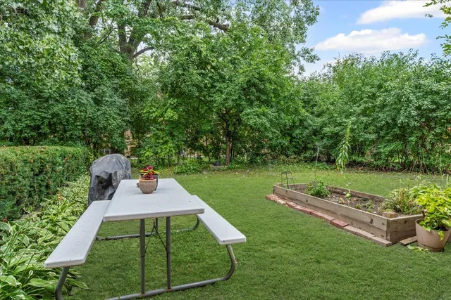 a park view with a sitting space and garden