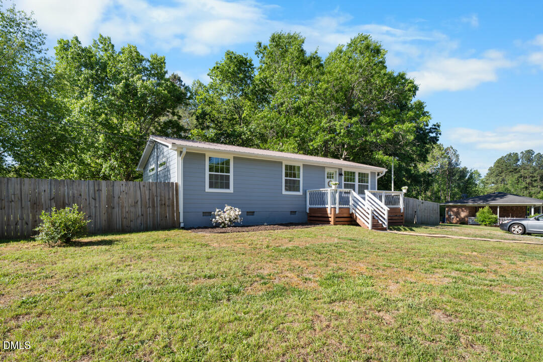 454 Cedar Creek Road Timberlake, NC 27583 - Photo 5 of 39 a view of a house with backyard and sitting area