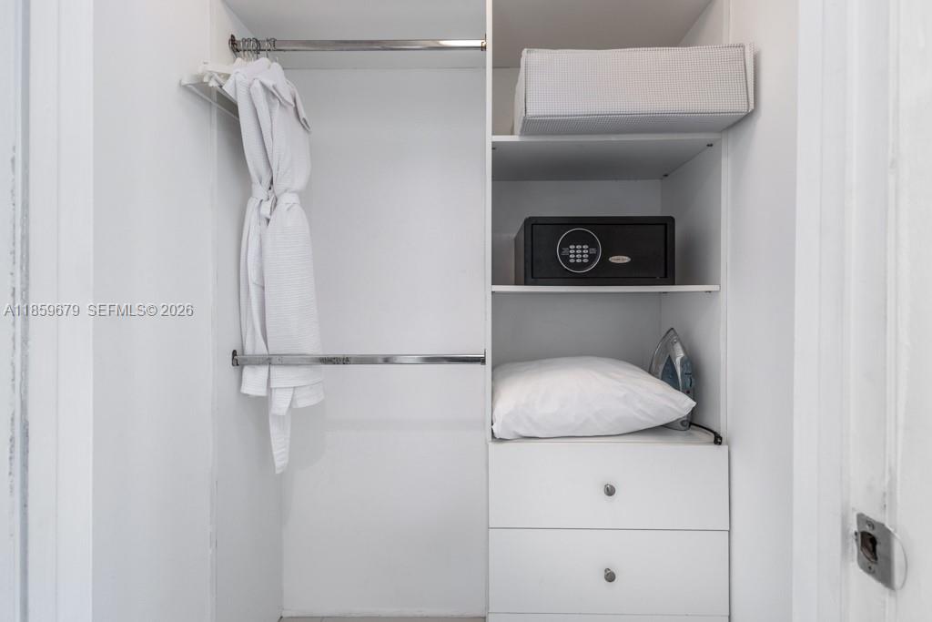 485 Brickell Avenue, Unit 2210 Miami, FL 33131 - Photo 22 of 71 a bathroom with a shower and a sink