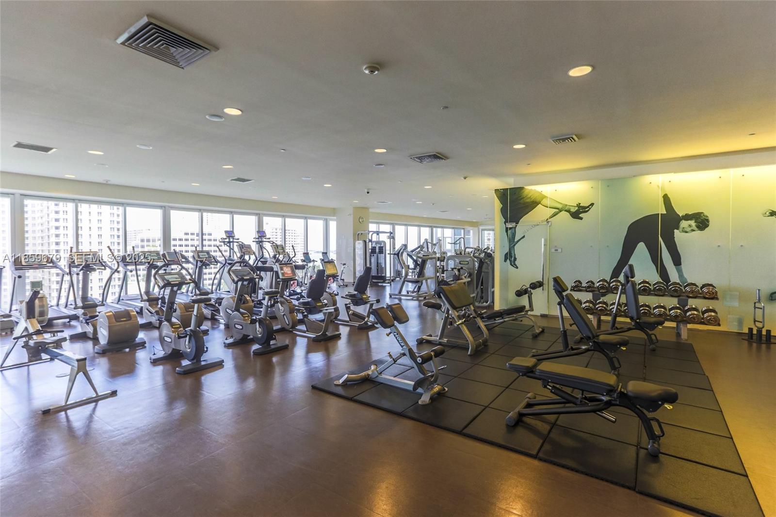 485 Brickell Avenue, Unit 2210 Miami, FL 33131 - Photo 41 of 66 a view of a room with gym equipment