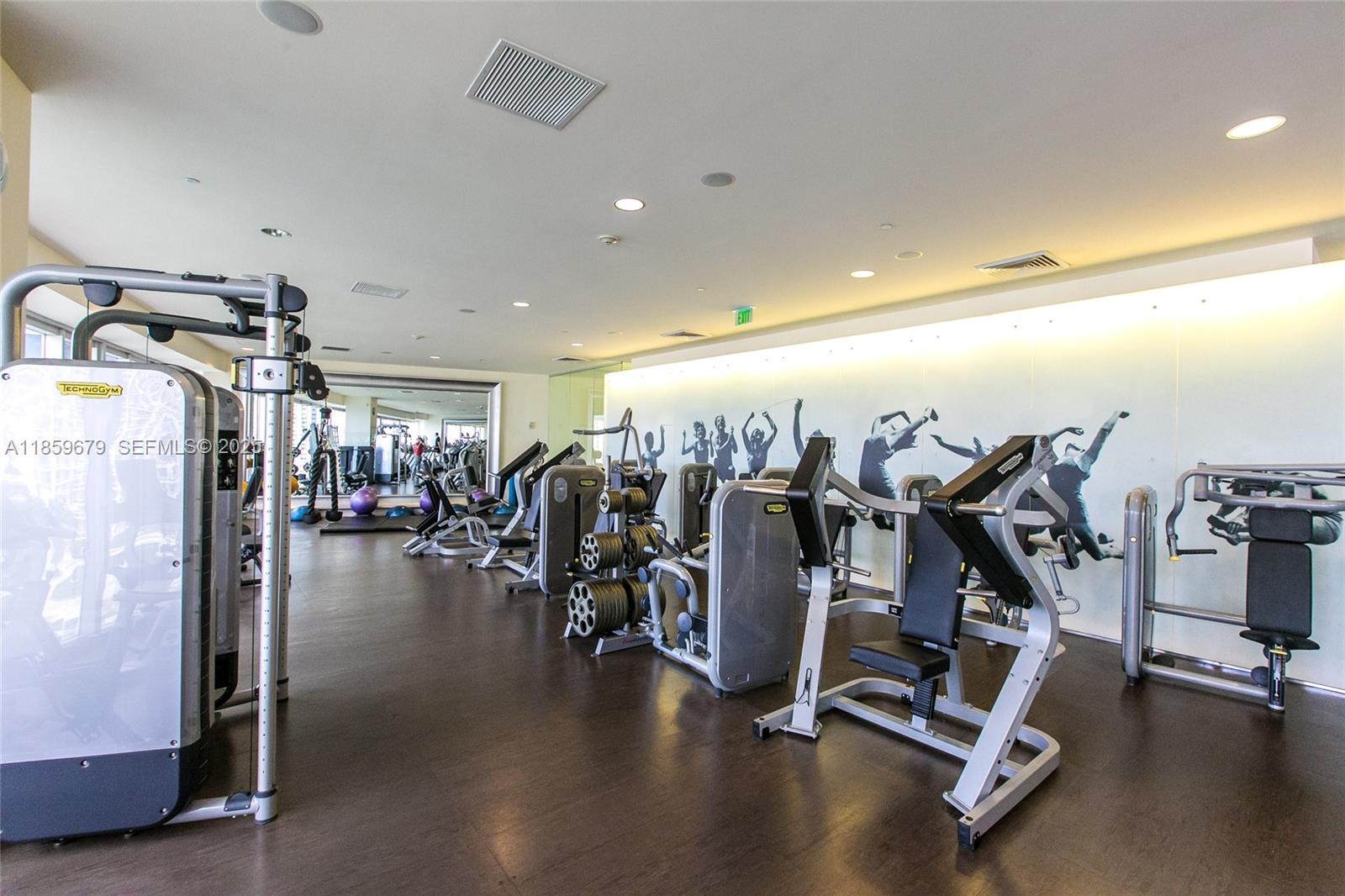 485 Brickell Avenue, Unit 2210 Miami, FL 33131 - Photo 42 of 66 a view of a room with gym equipment