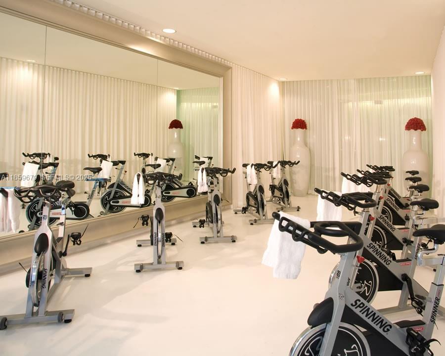 485 Brickell Avenue, Unit 2210 Miami, FL 33131 - Photo 43 of 66 a view of a room with gym equipment