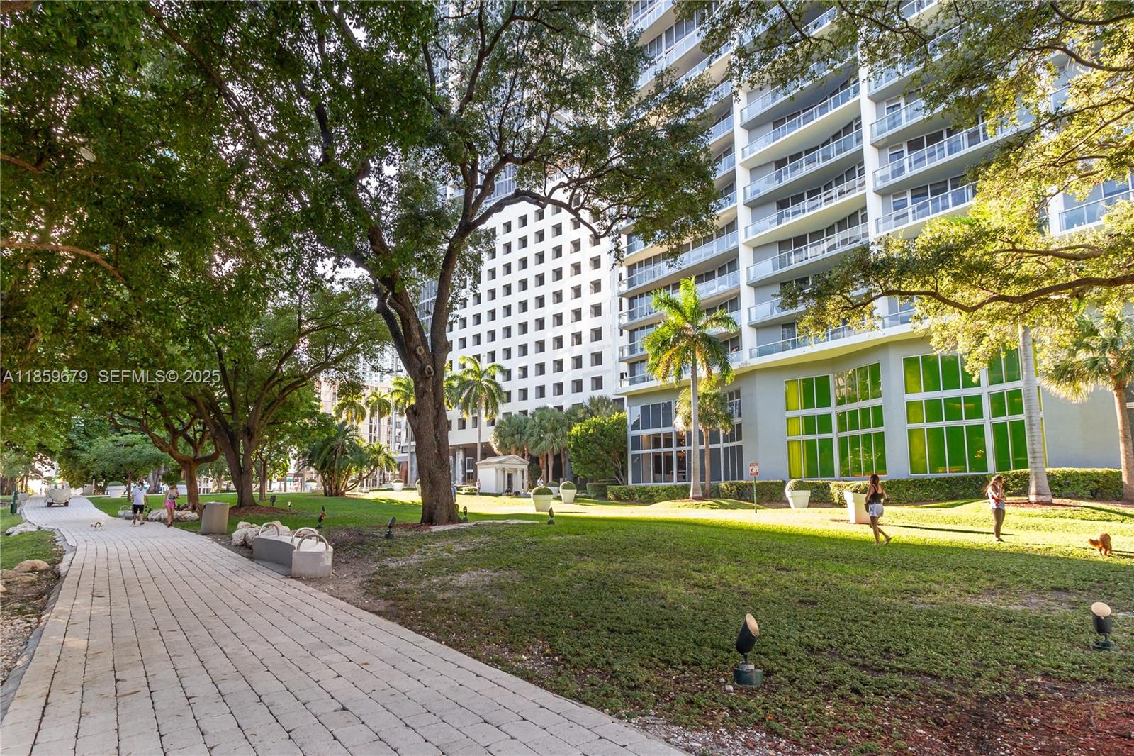 485 Brickell Avenue, Unit 2210 Miami, FL 33131 - Photo 60 of 66 a view of a building with a yard