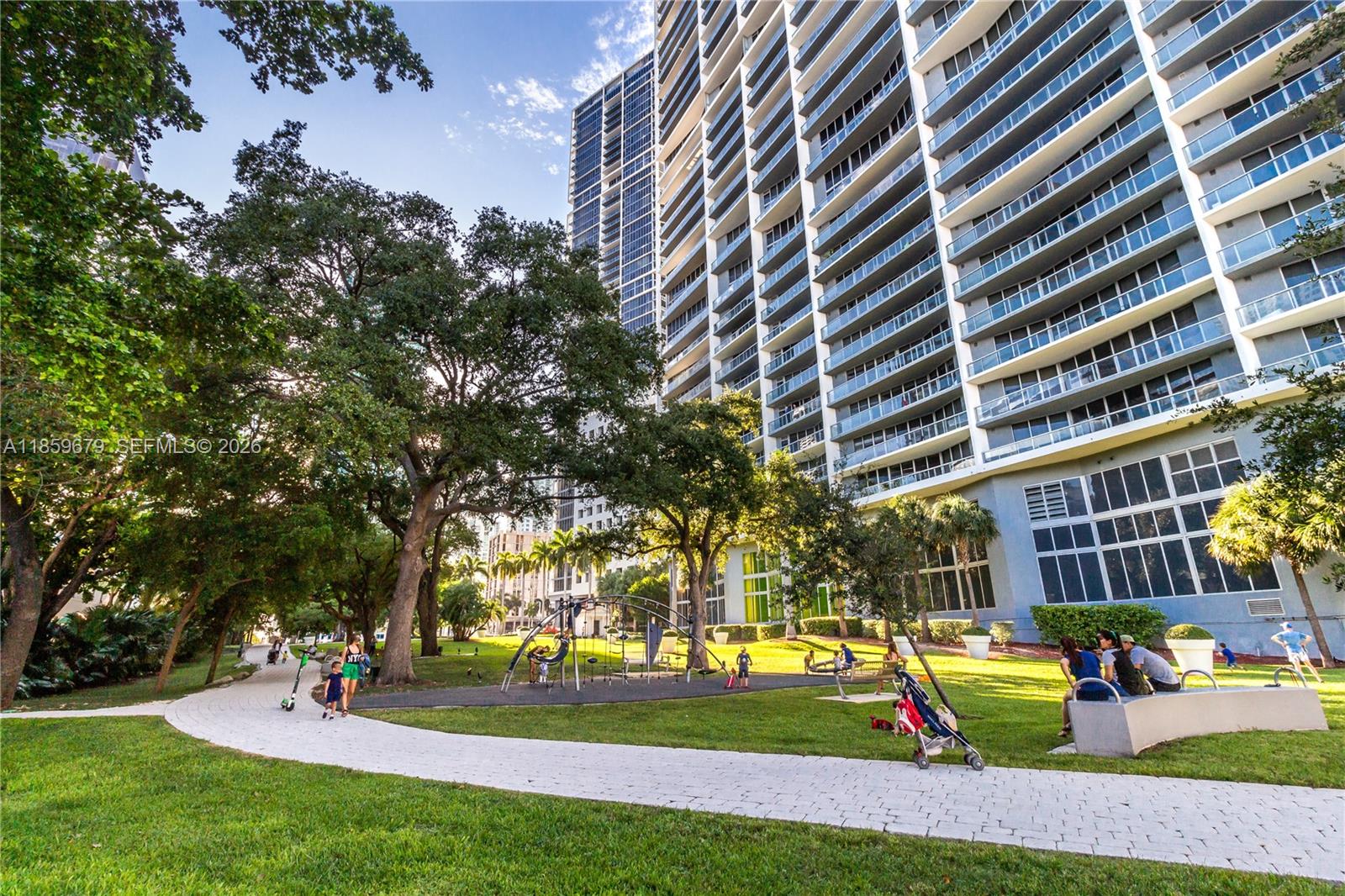 485 Brickell Avenue, Unit 2210 Miami, FL 33131 - Photo 62 of 71 a view of a building with a yard