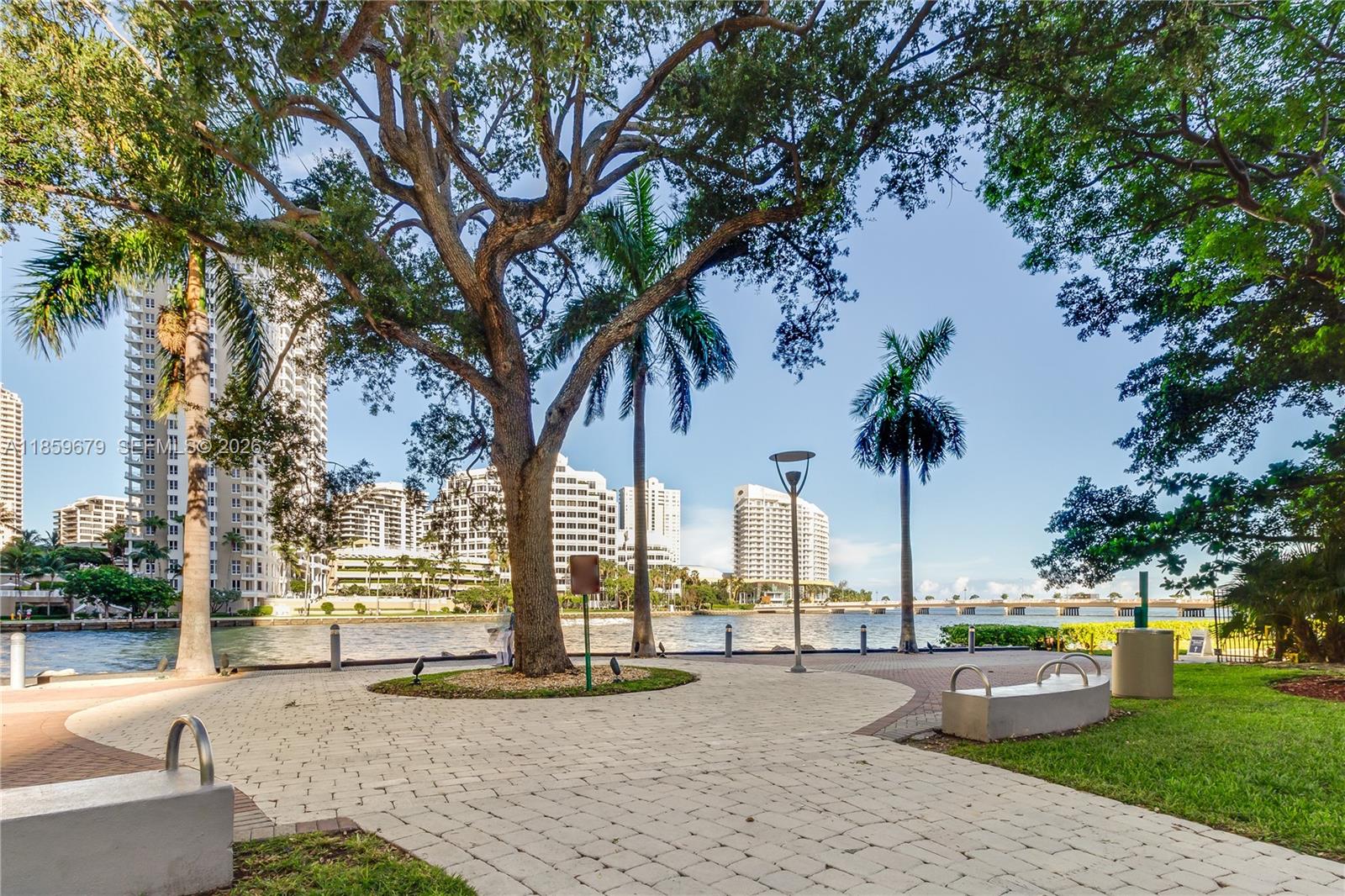 485 Brickell Avenue, Unit 2210 Miami, FL 33131 - Photo 63 of 71 a swimming pool with yard and outdoor seating