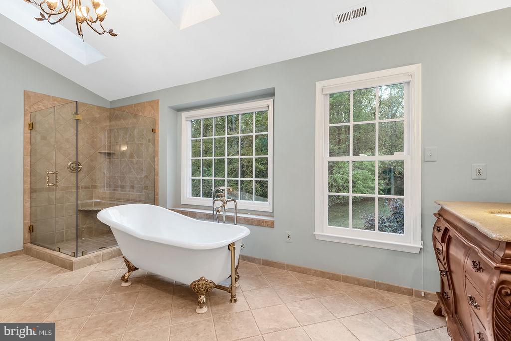 5501 West Ridge View Drive Fairfax, VA 22030 - Photo 18 of 30 Tastefully updated master bath with tub and shower
