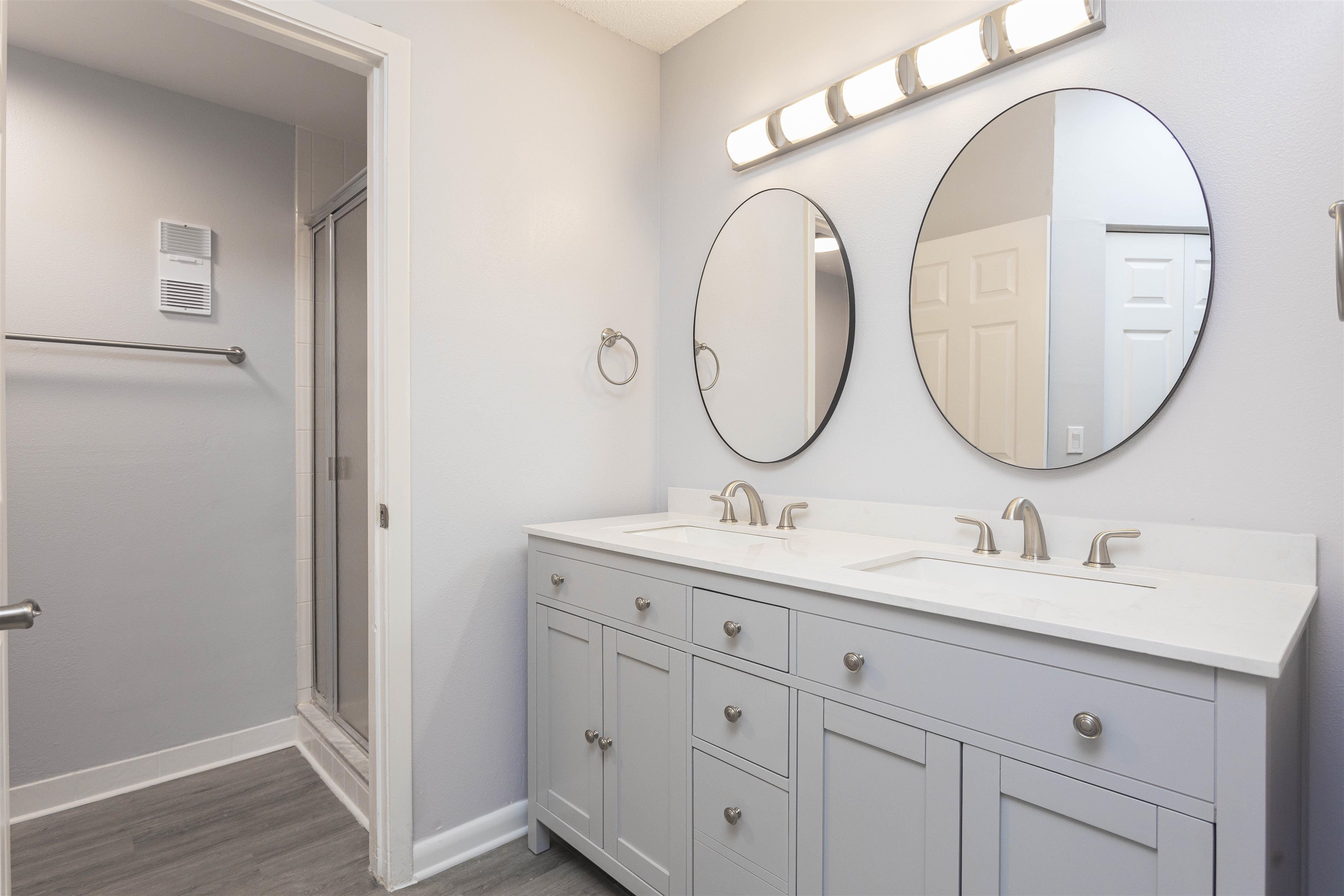 9 Aledo Court St. Augustine, FL 32086 - Photo 11 of 33 a bathroom with a granite countertop double vanity sink and a mirror