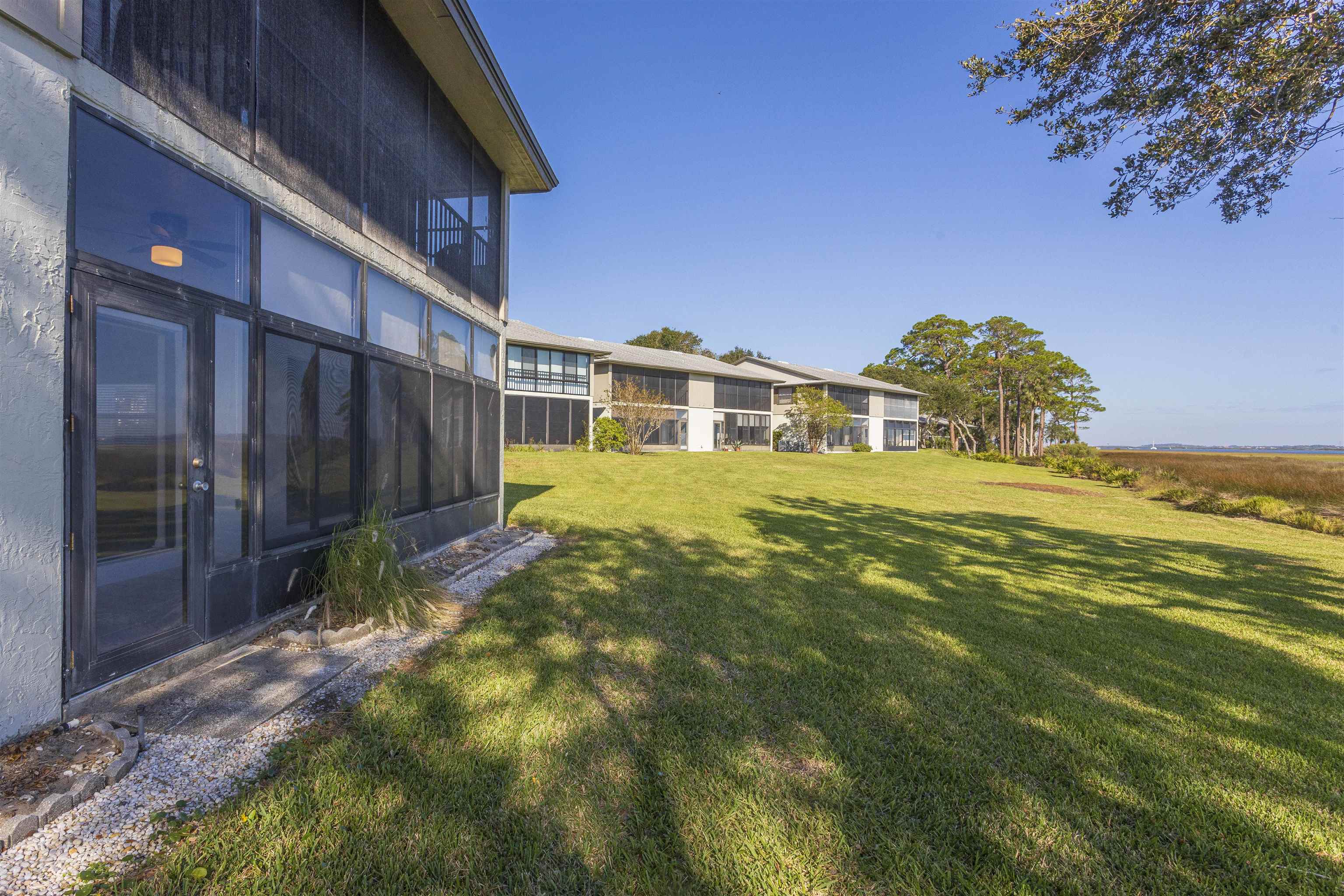 9 Aledo Court St. Augustine, FL 32086 - Photo 21 of 33 a view of a house with a backyard