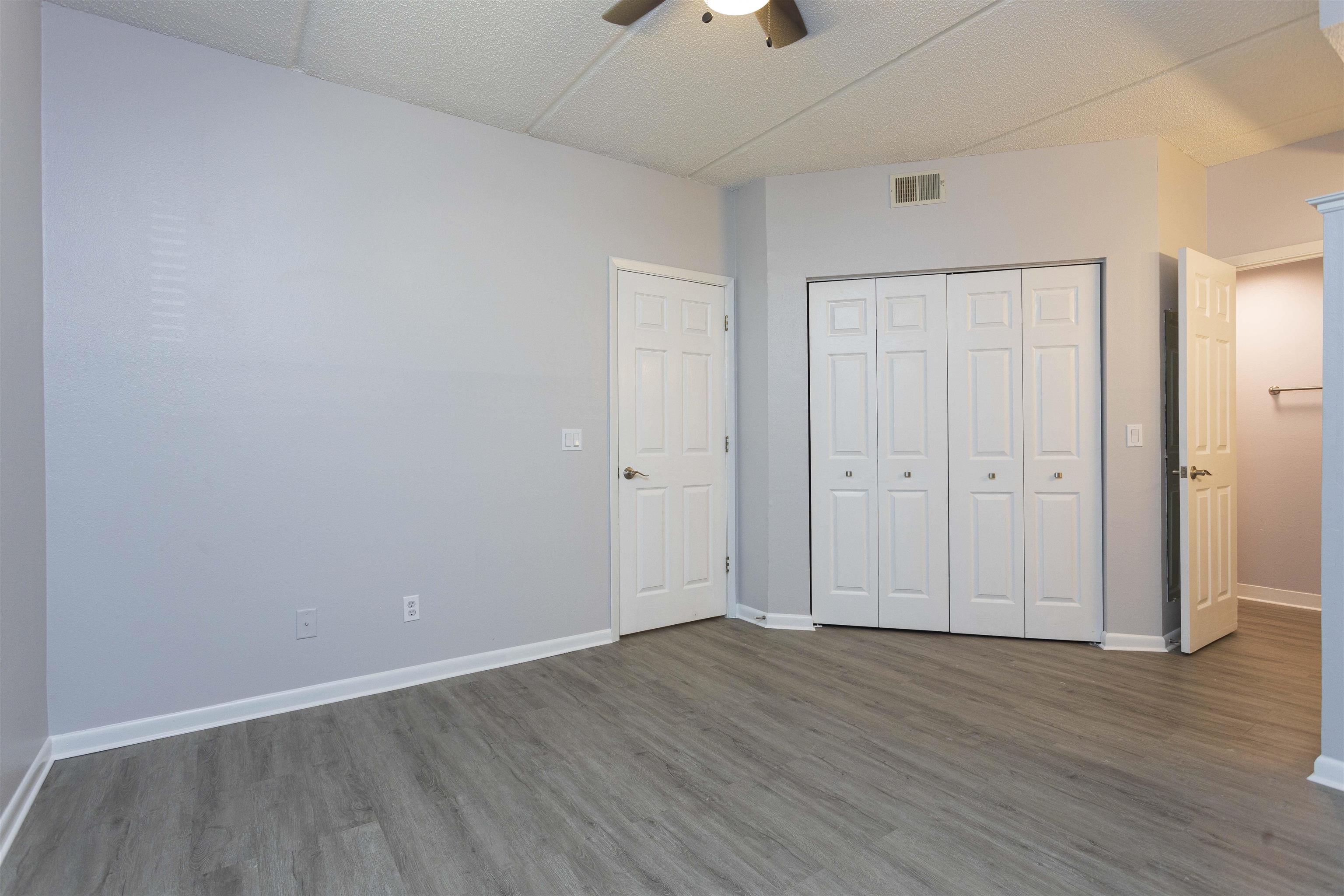 9 Aledo Court St. Augustine, FL 32086 - Photo 10 of 33 a view of an empty room with wooden floor