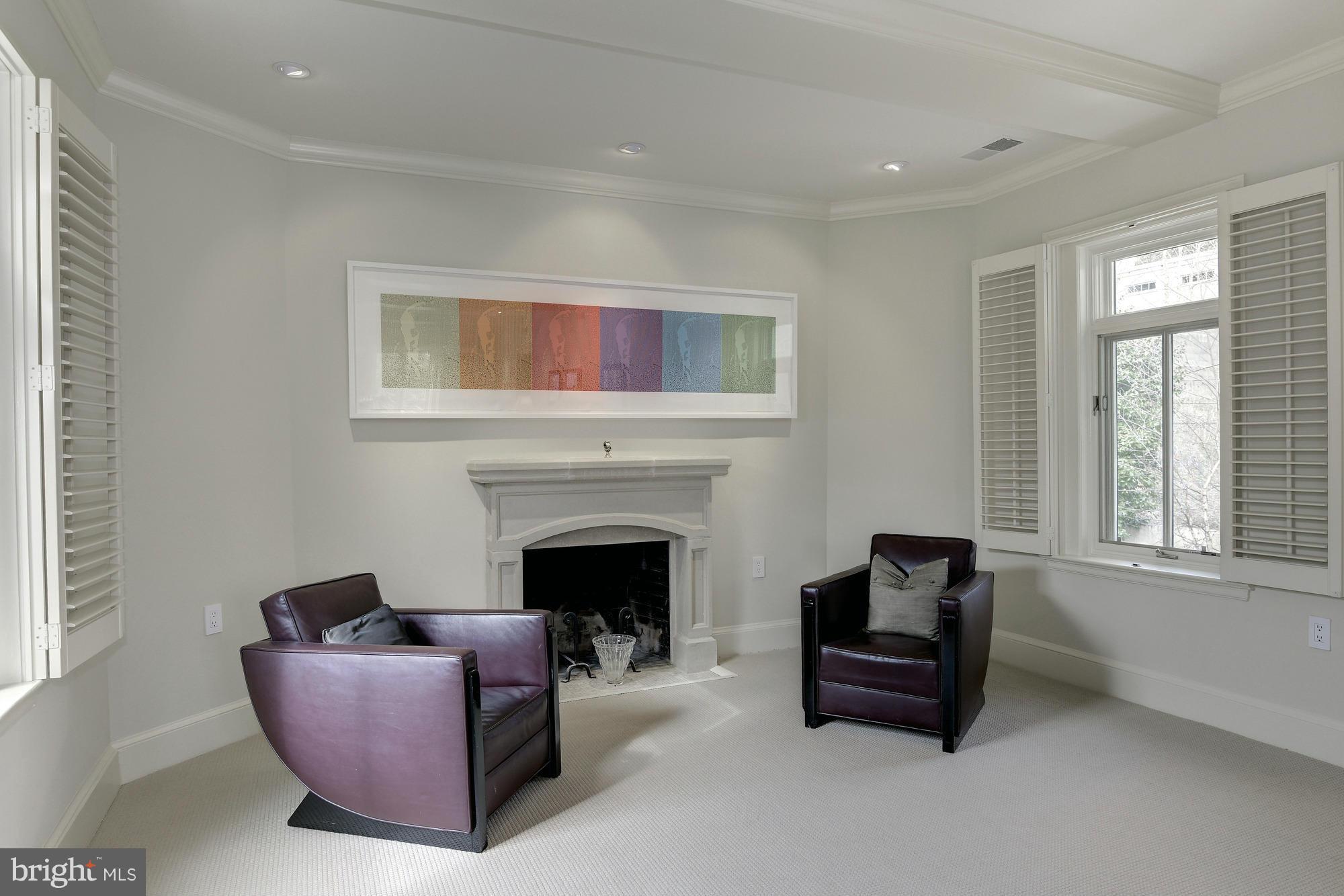 2441 California Street Northwest Washington, DC 20008 - Photo 10 of 22 a living room with furniture and a fireplace