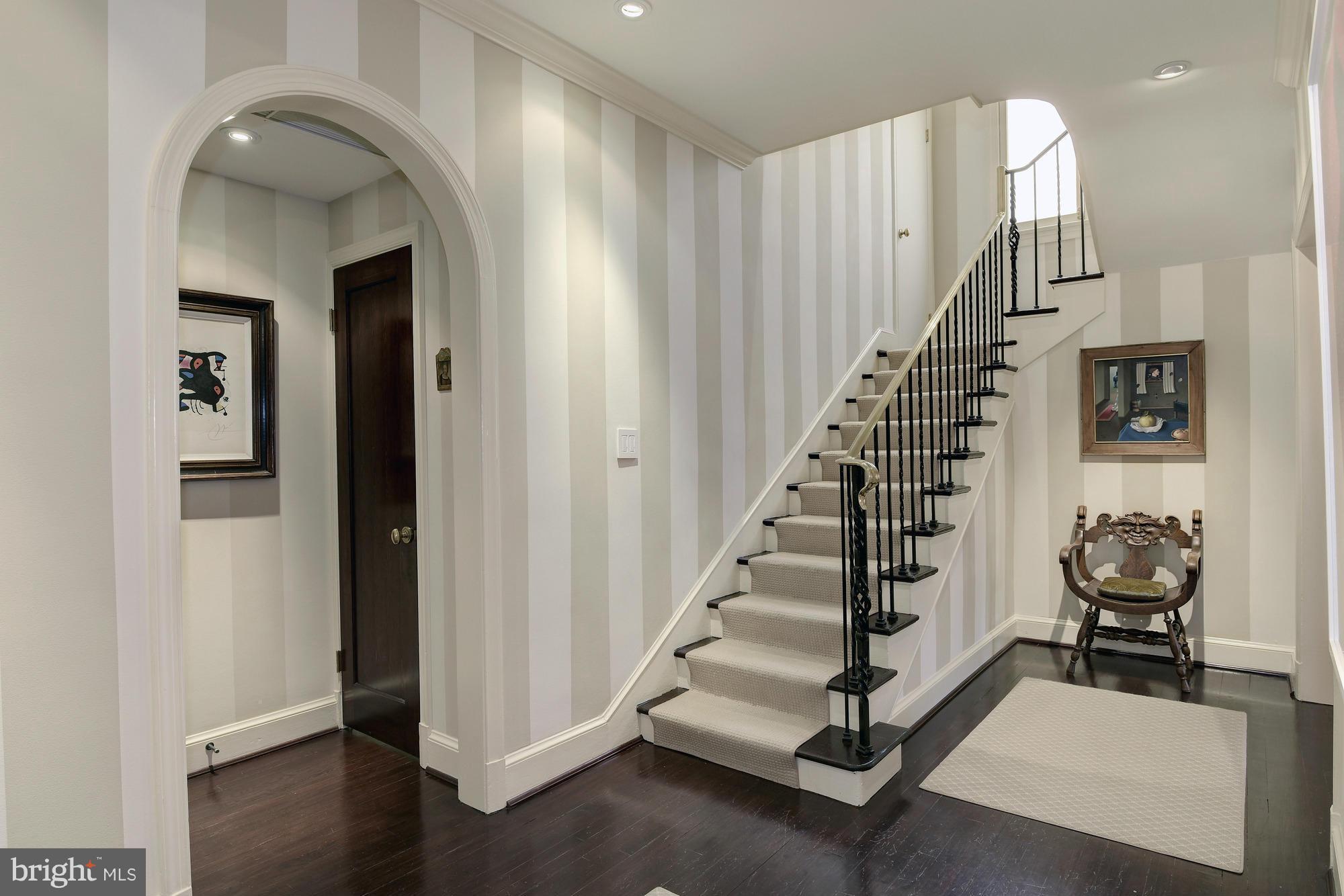 2441 California Street Northwest Washington, DC 20008 - Photo 2 of 22 a view of entryway with livingroom and hardwood floor