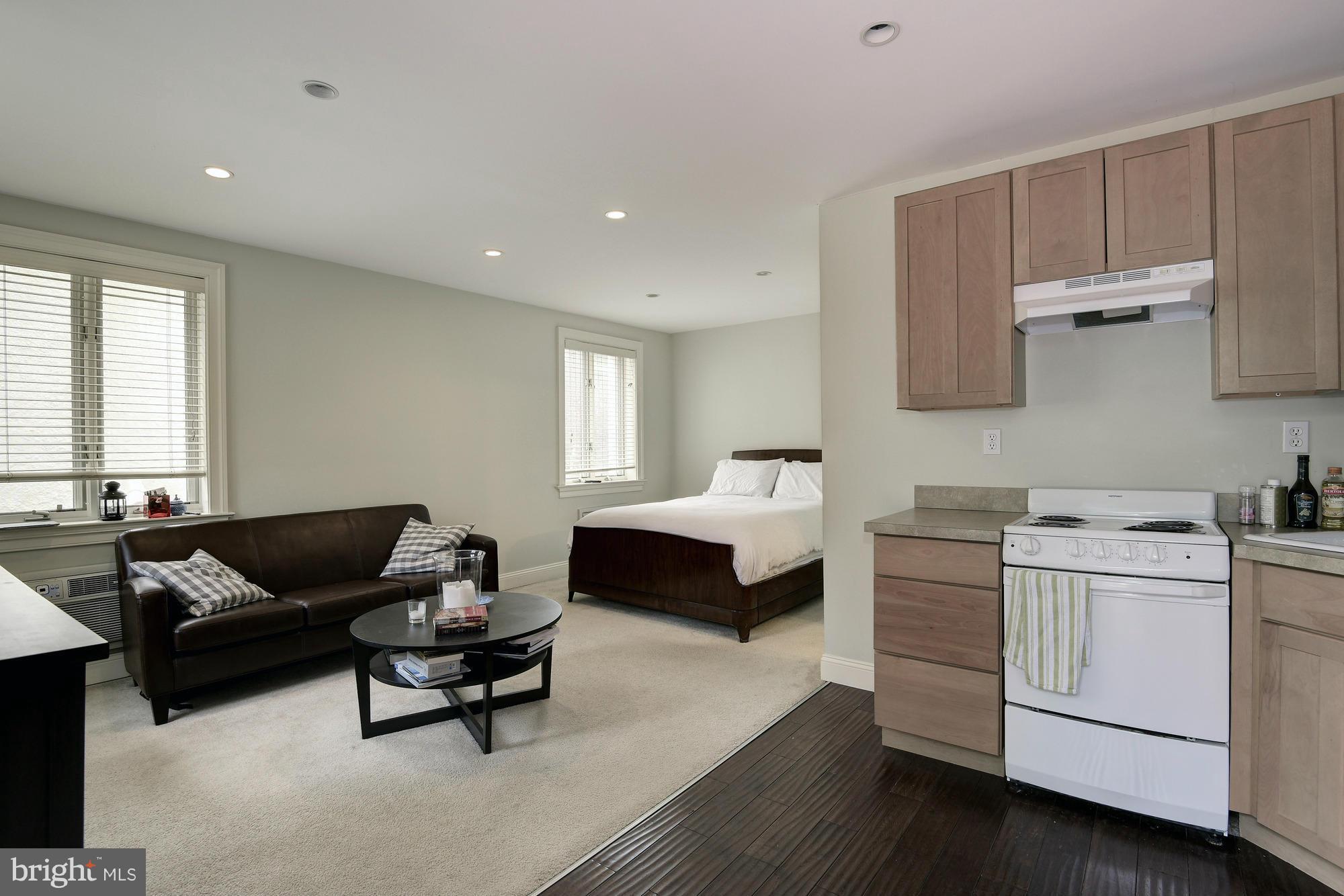2441 California Street Northwest Washington, DC 20008 - Photo 20 of 22 a bedroom with furniture and windows