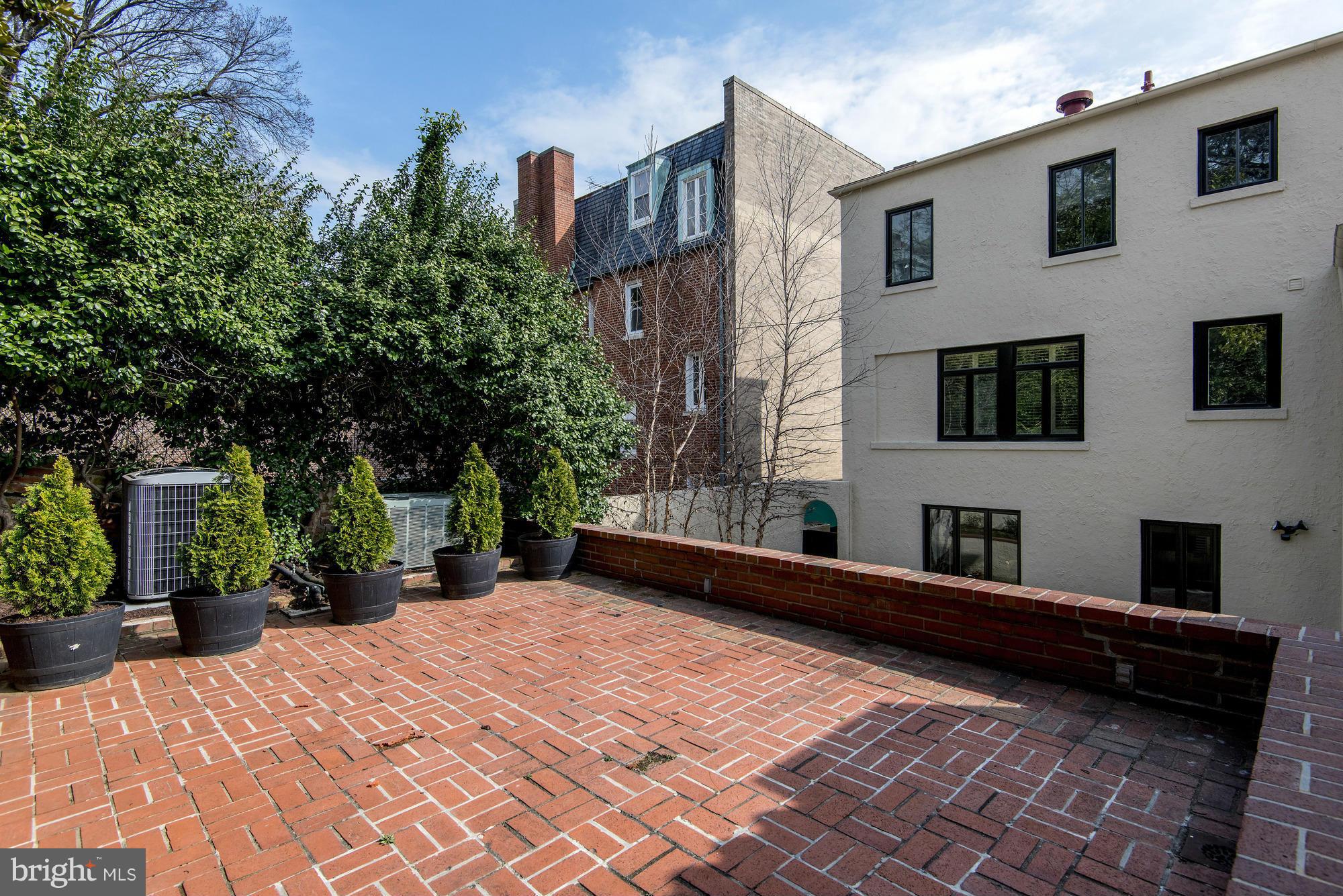 2441 California Street Northwest Washington, DC 20008 - Photo 21 of 22 a view of a house with a yard