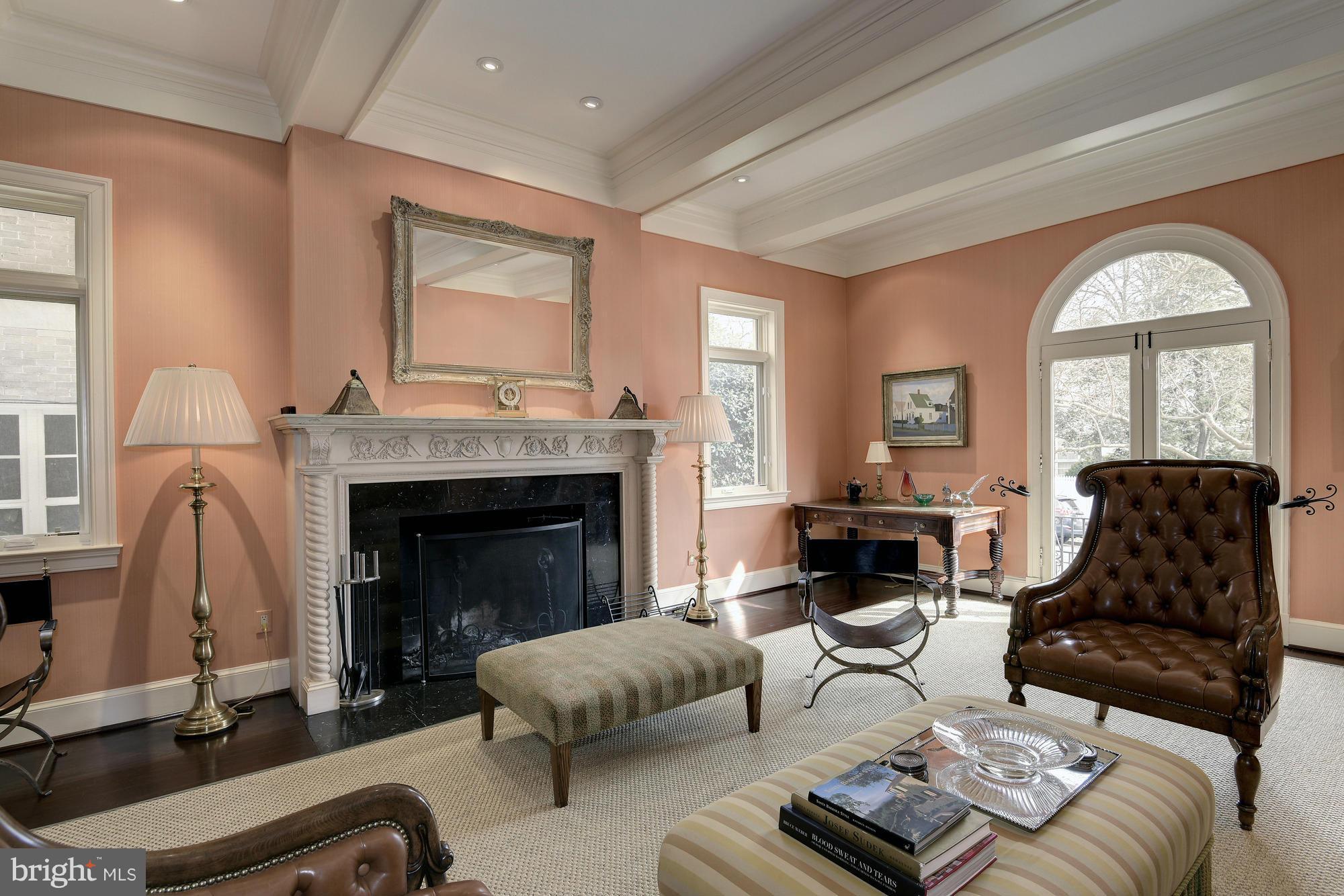 2441 California Street Northwest Washington, DC 20008 - Photo 3 of 22 a living room with furniture and a fireplace