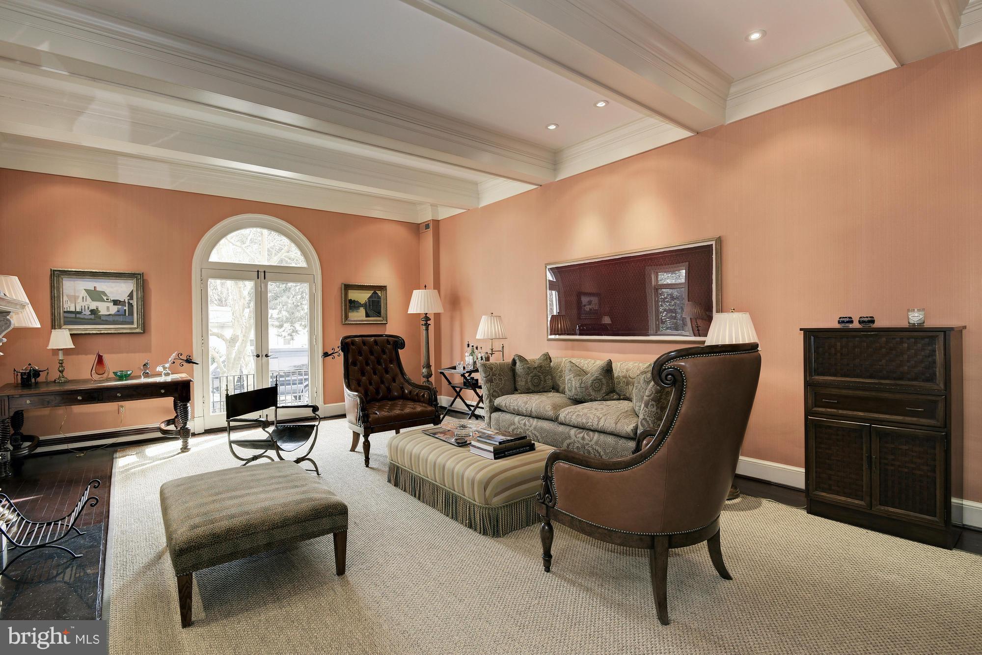 2441 California Street Northwest Washington, DC 20008 - Photo 4 of 22 a living room with furniture a large window and a flat screen tv