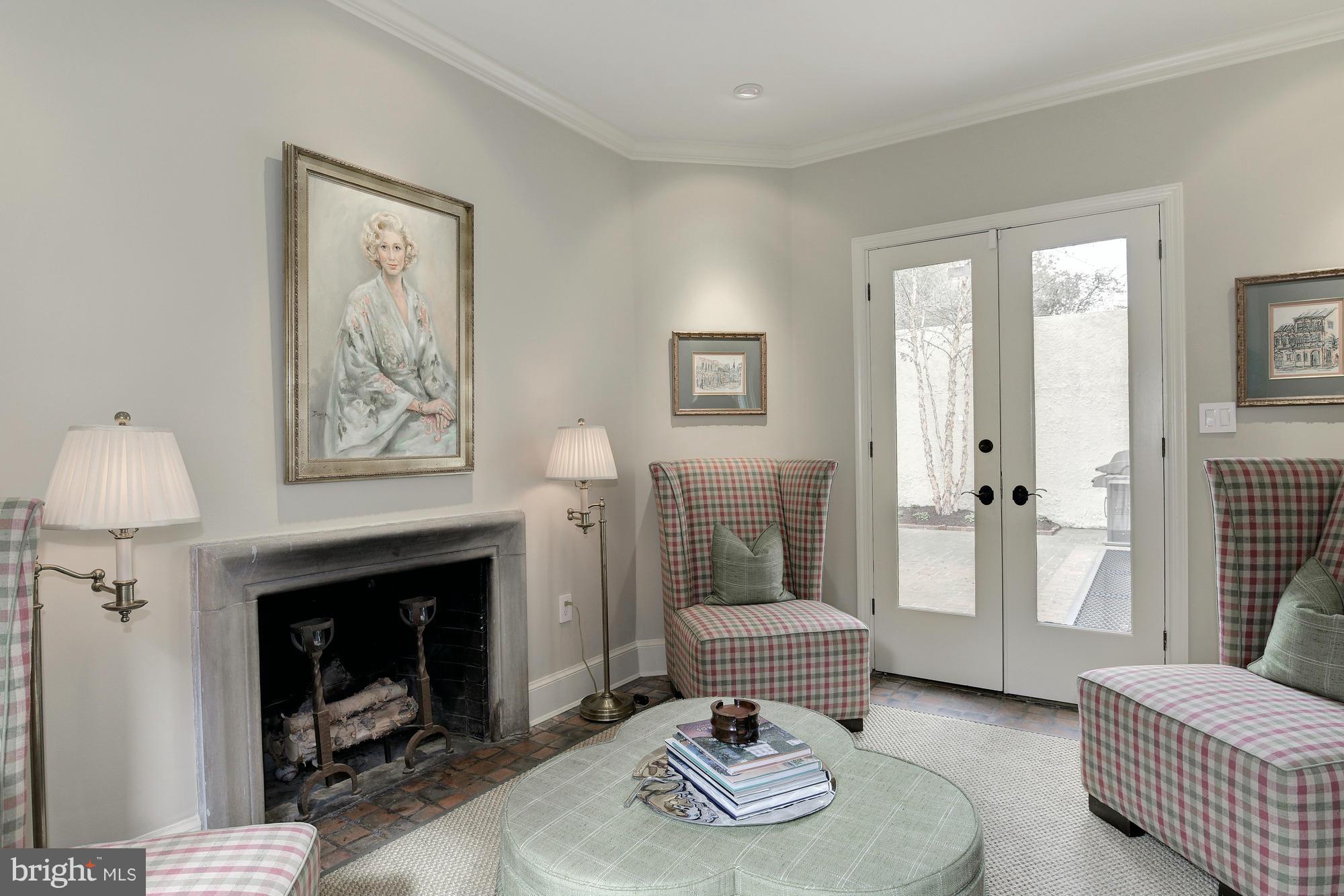 2441 California Street Northwest Washington, DC 20008 - Photo 6 of 22 a living room with furniture and a fireplace