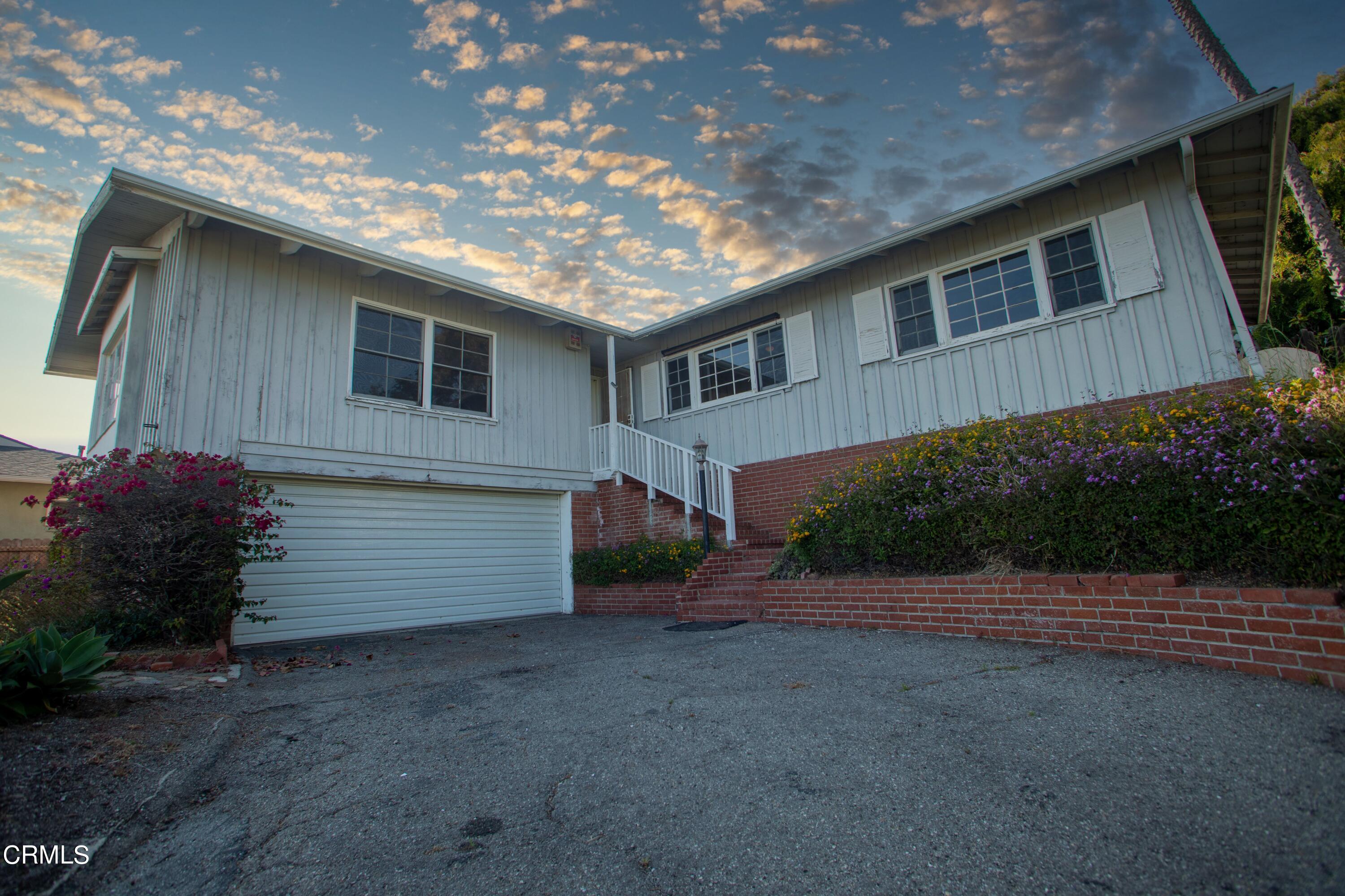 2971 Foothill Road Ventura, CA 93003 - Photo 1 of 25 a view of a house with a yard