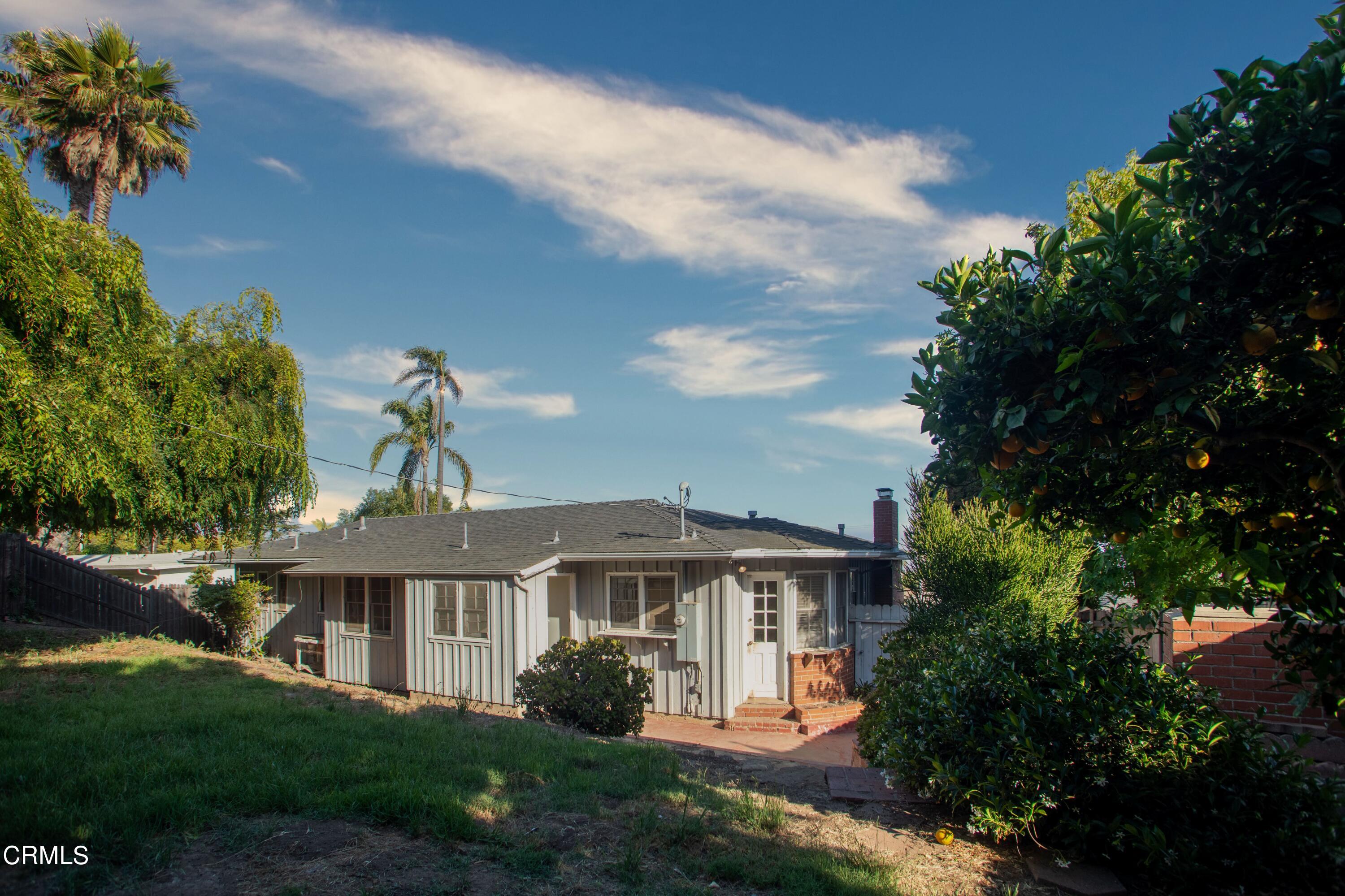 2971 Foothill Road Ventura, CA 93003 - Photo 19 of 25 a front view of a house with a garden