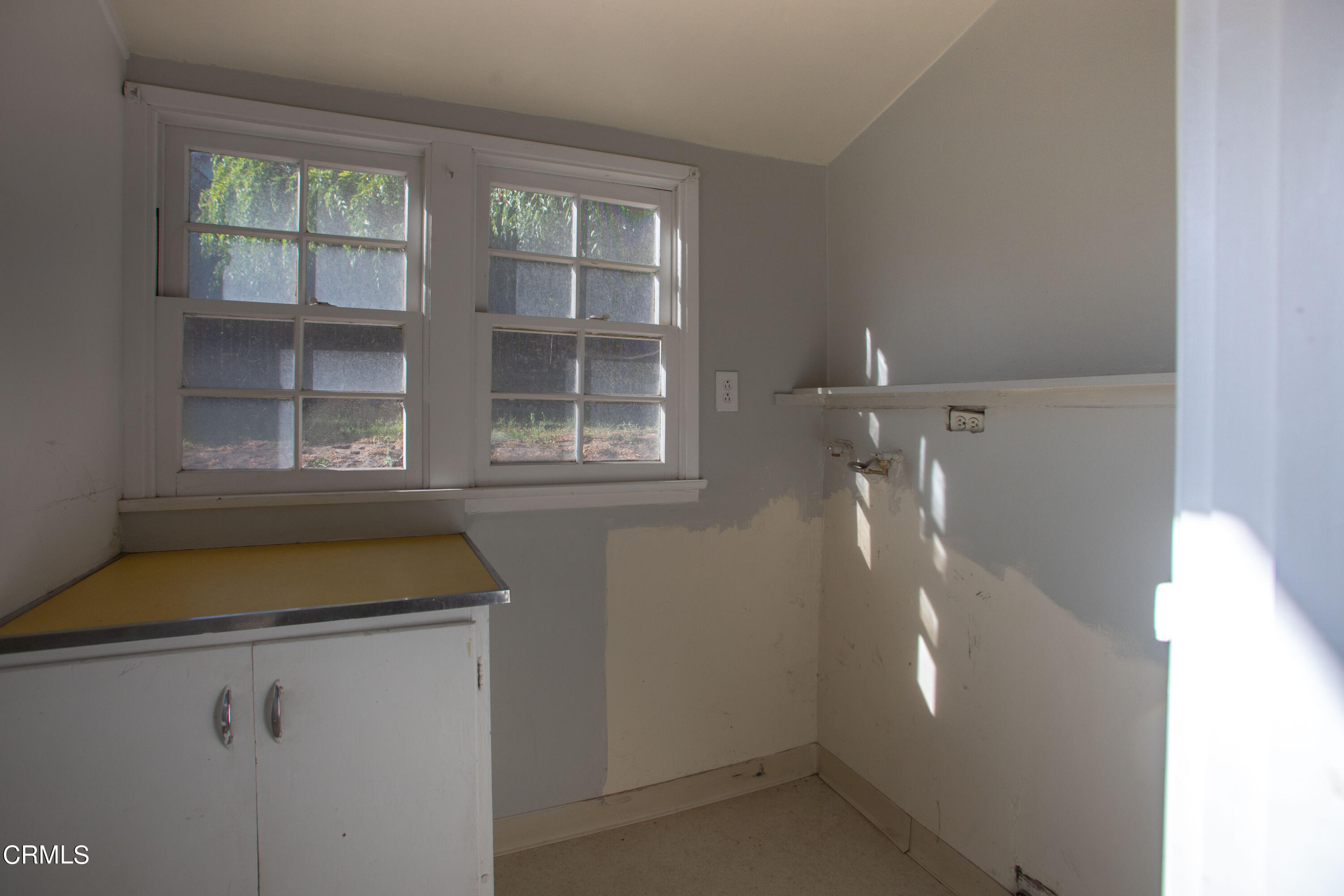 2971 Foothill Road Ventura, CA 93003 - Photo 9 of 25 a room with a window and dryer