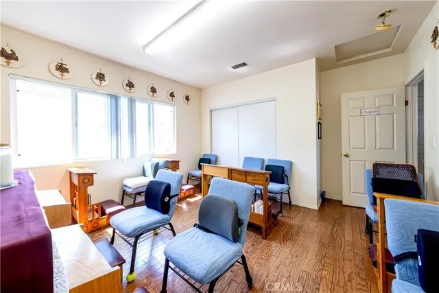 a bathroom with a tub sink toilet and mirror
