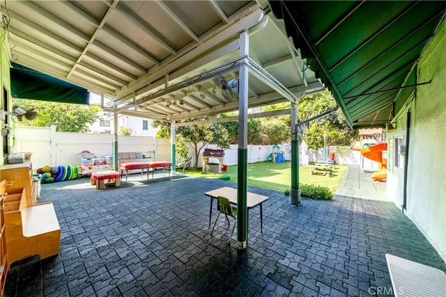 a utility room with lots of swings and slides