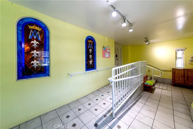 a view of entryway with a front door