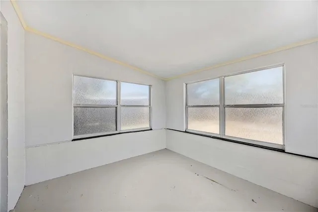 an empty room with window